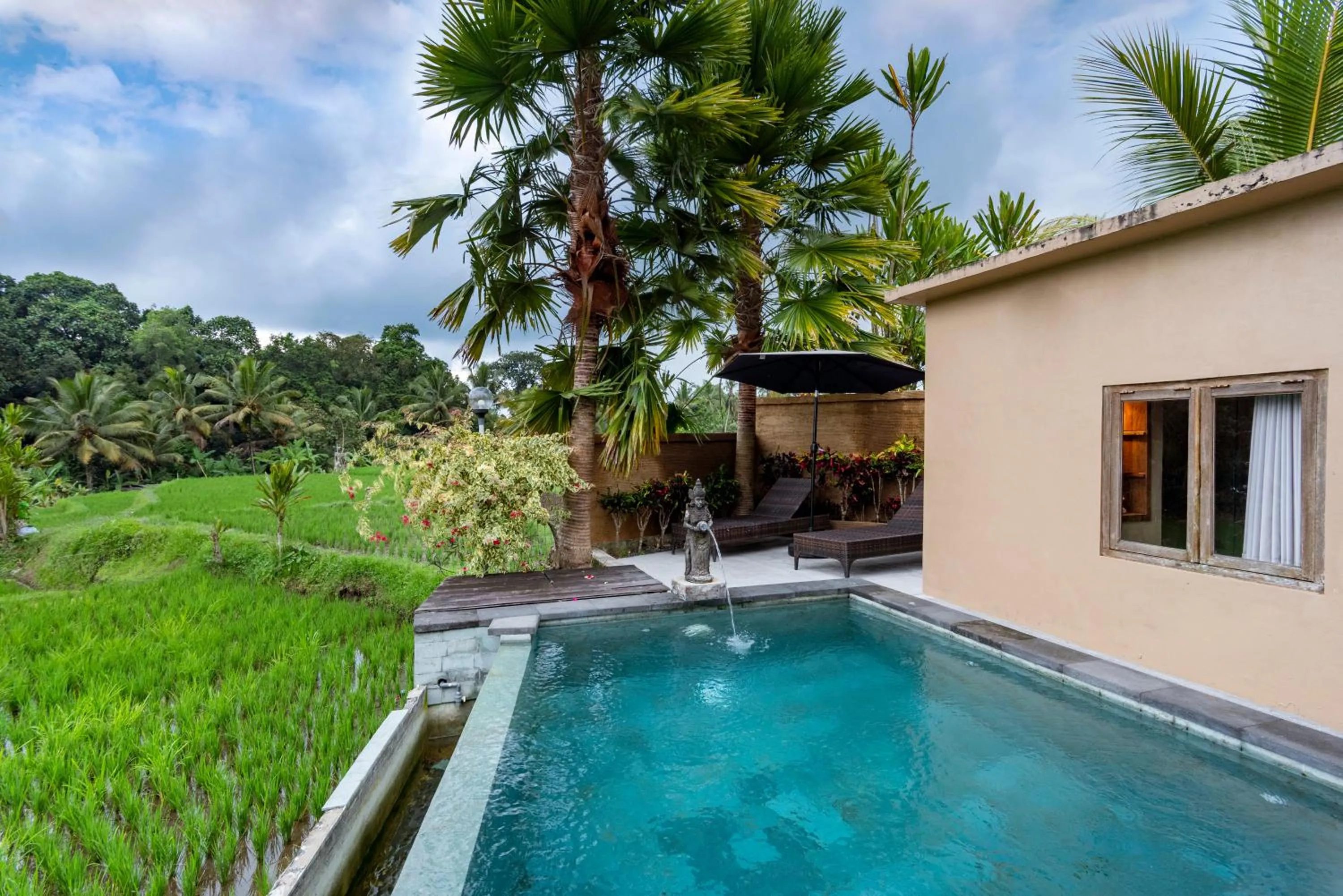 Pool view in Taksu Villa Ubud Sebatu by Dhananjaya Hospitality