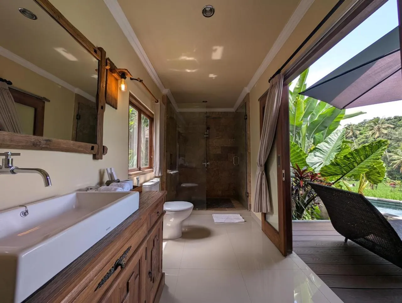 Bathroom in Taksu Resort Ubud by Dhananjaya Hospitality