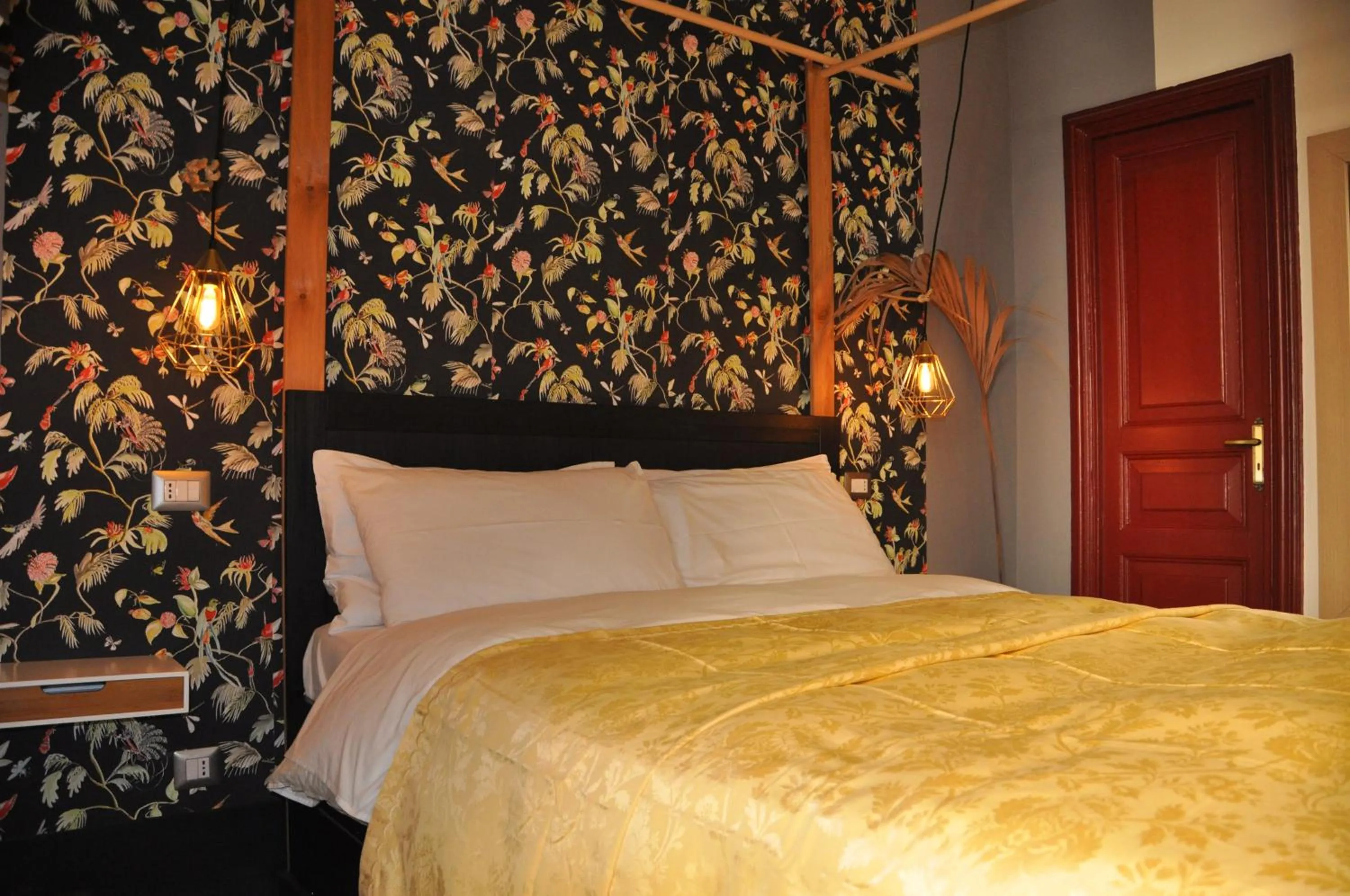 Decorative detail, Bed in Grand Tour Design Guest House Catania Self Check-in