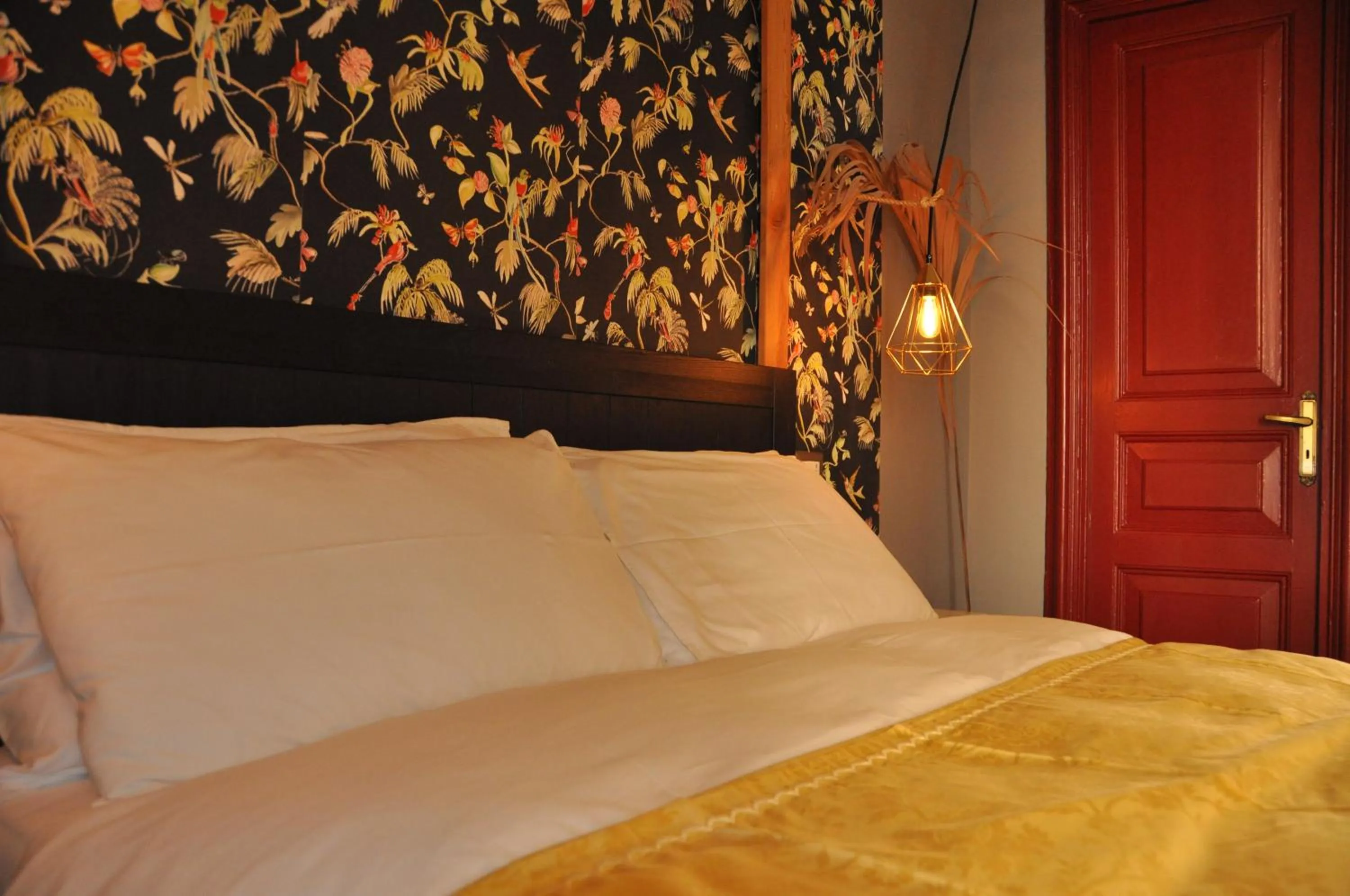 Decorative detail, Bed in Grand Tour Design Guest House Catania Self Check-in