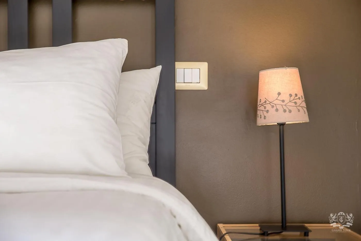 Decorative detail, Bed in Grand Tour Design Guest House Catania Self Check-in