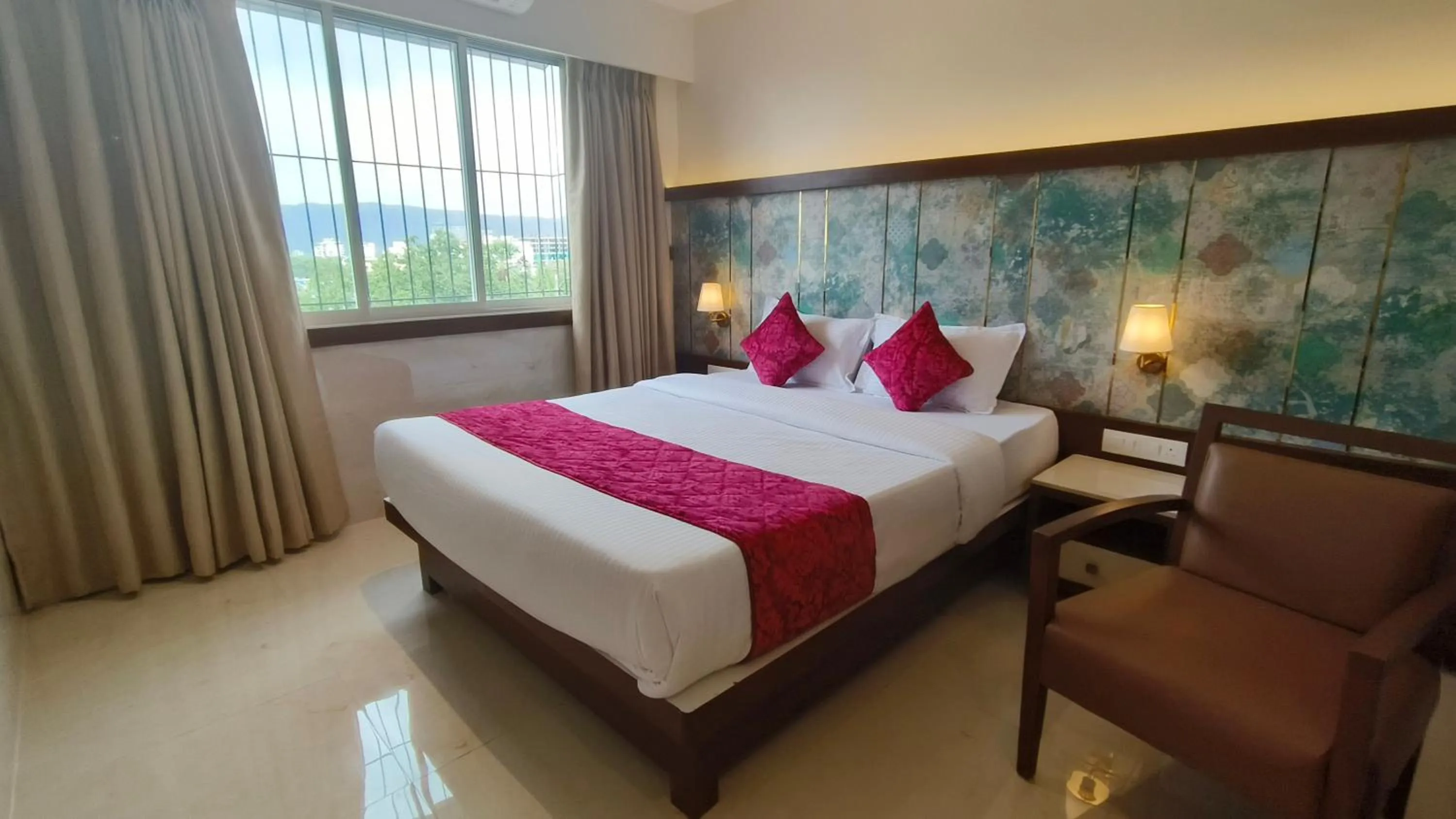 Bed in Hotel Prestige Residency