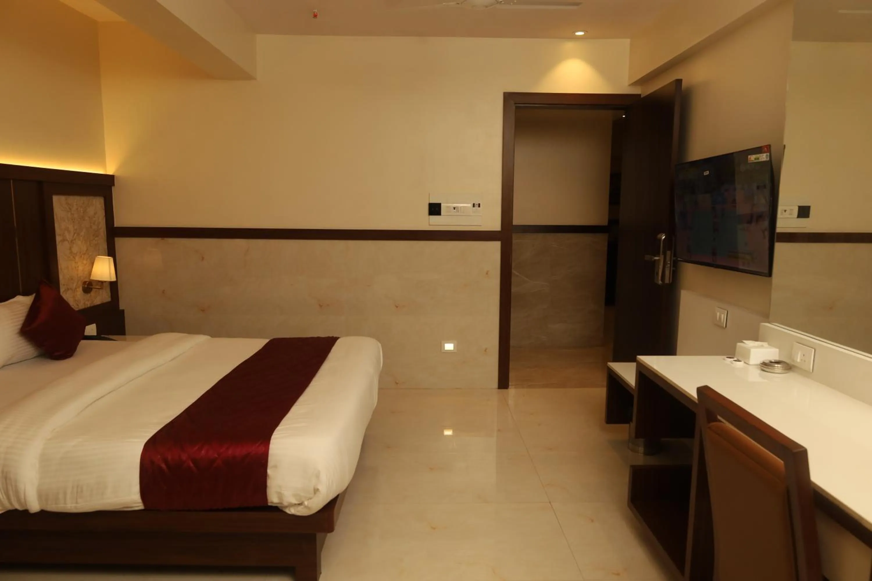 Communal lounge/ TV room, Bed in Hotel Prestige Residency