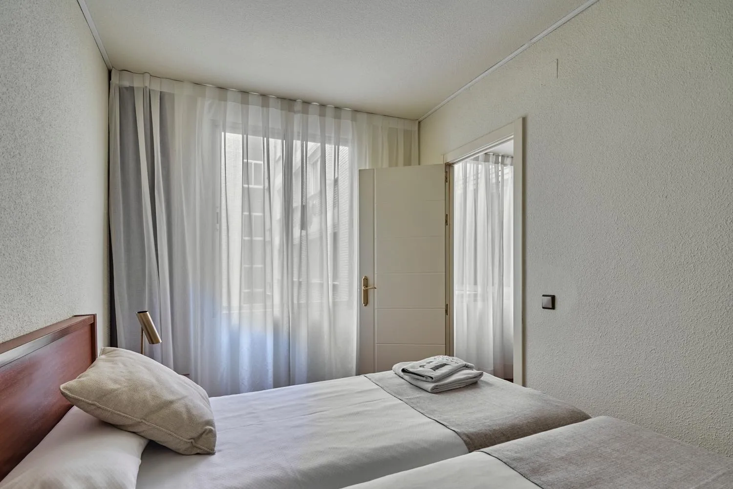 Bed in Apartamentos Juan Bravo