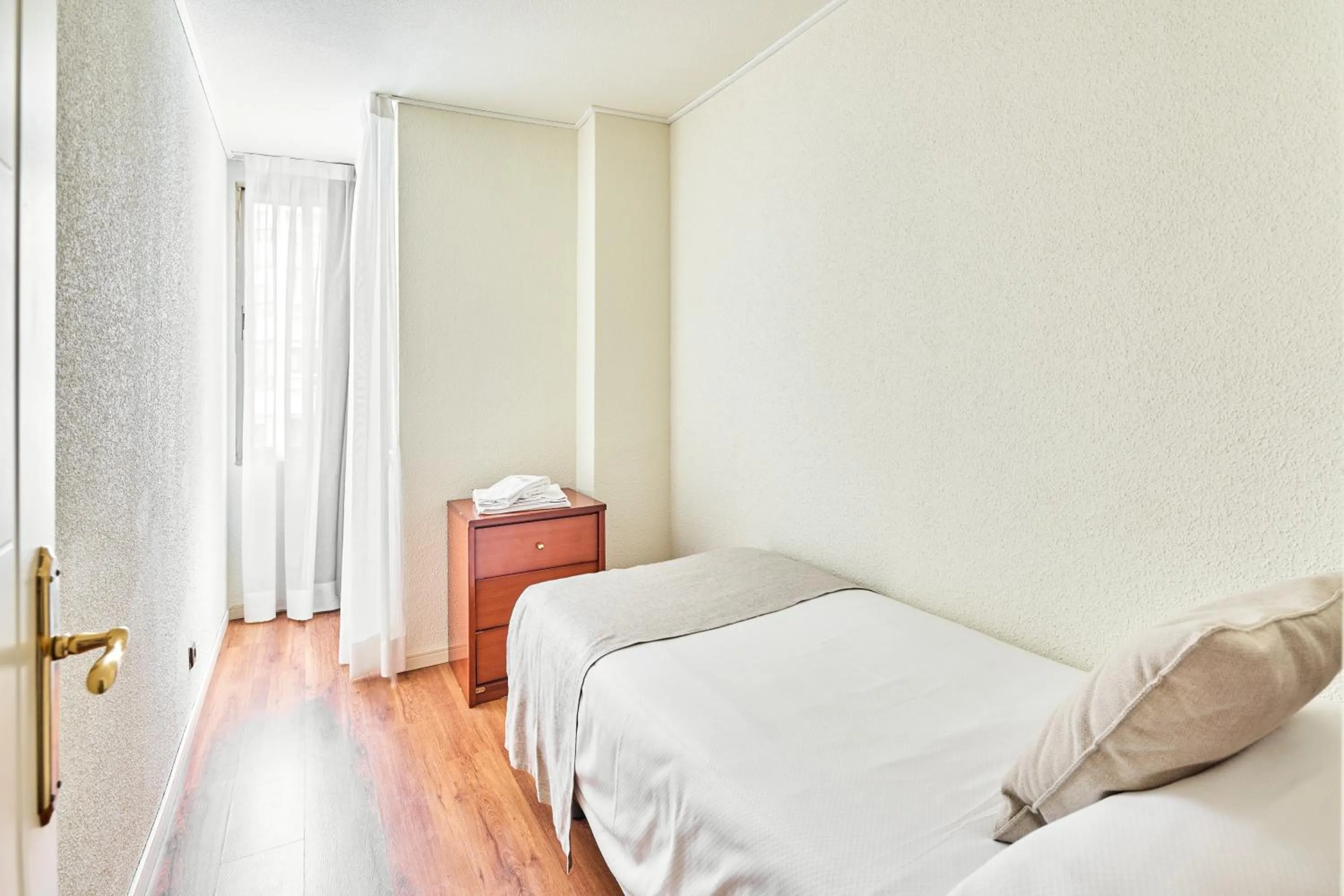 Bed in Apartamentos Juan Bravo