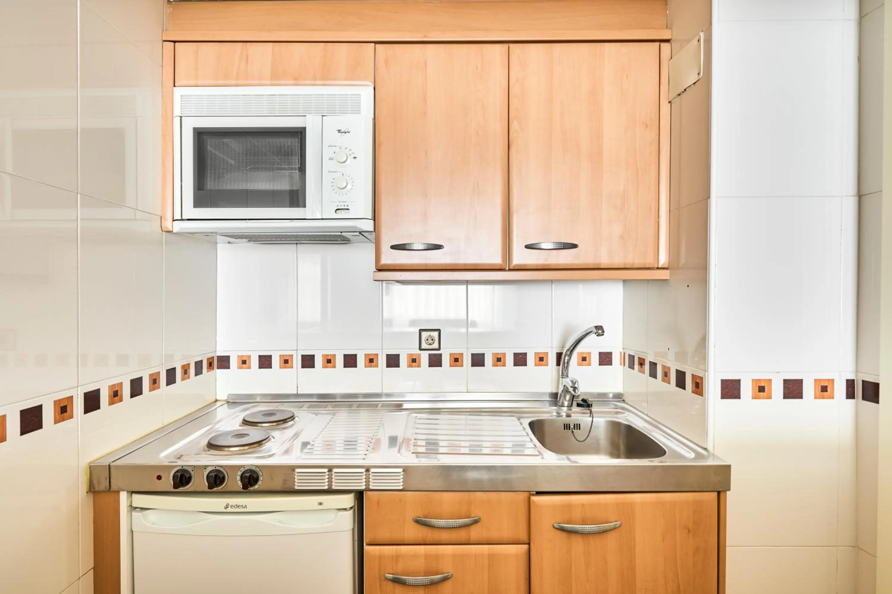 Kitchen or kitchenette in Apartamentos Juan Bravo