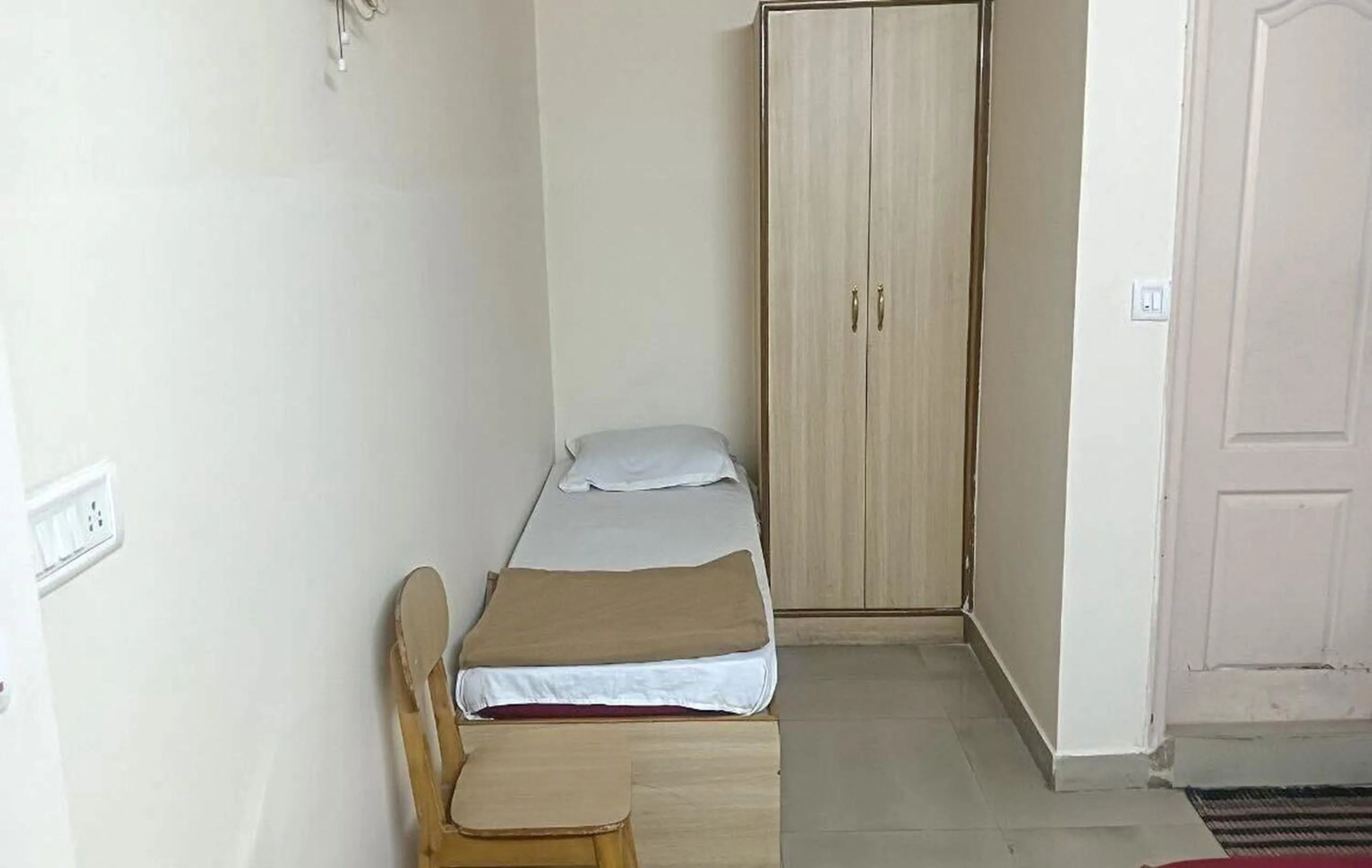 Bedroom, Bed in Hotel Rainbow near Victoria Hospital City Market