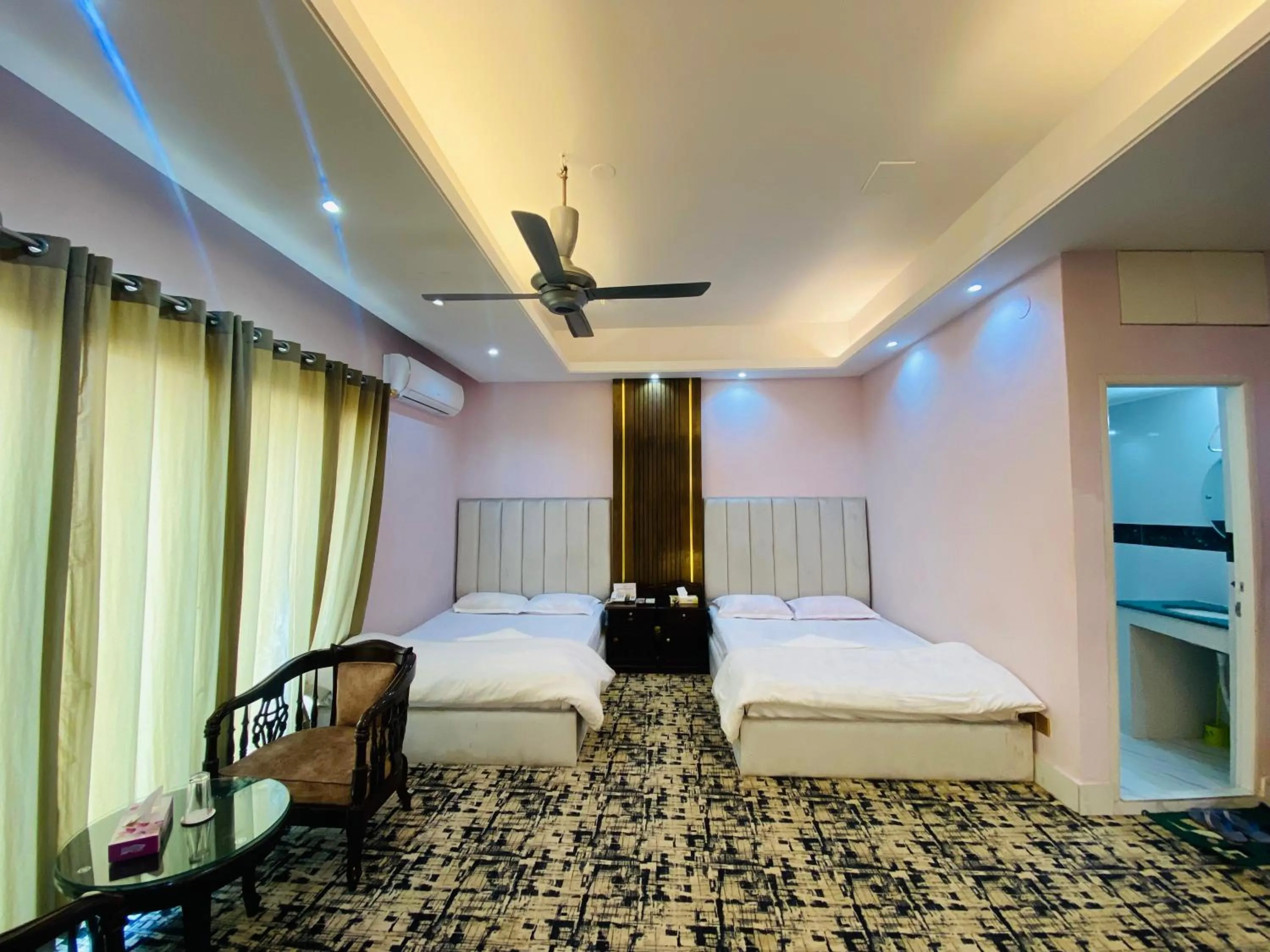 Bed in Hotel Grand Akther