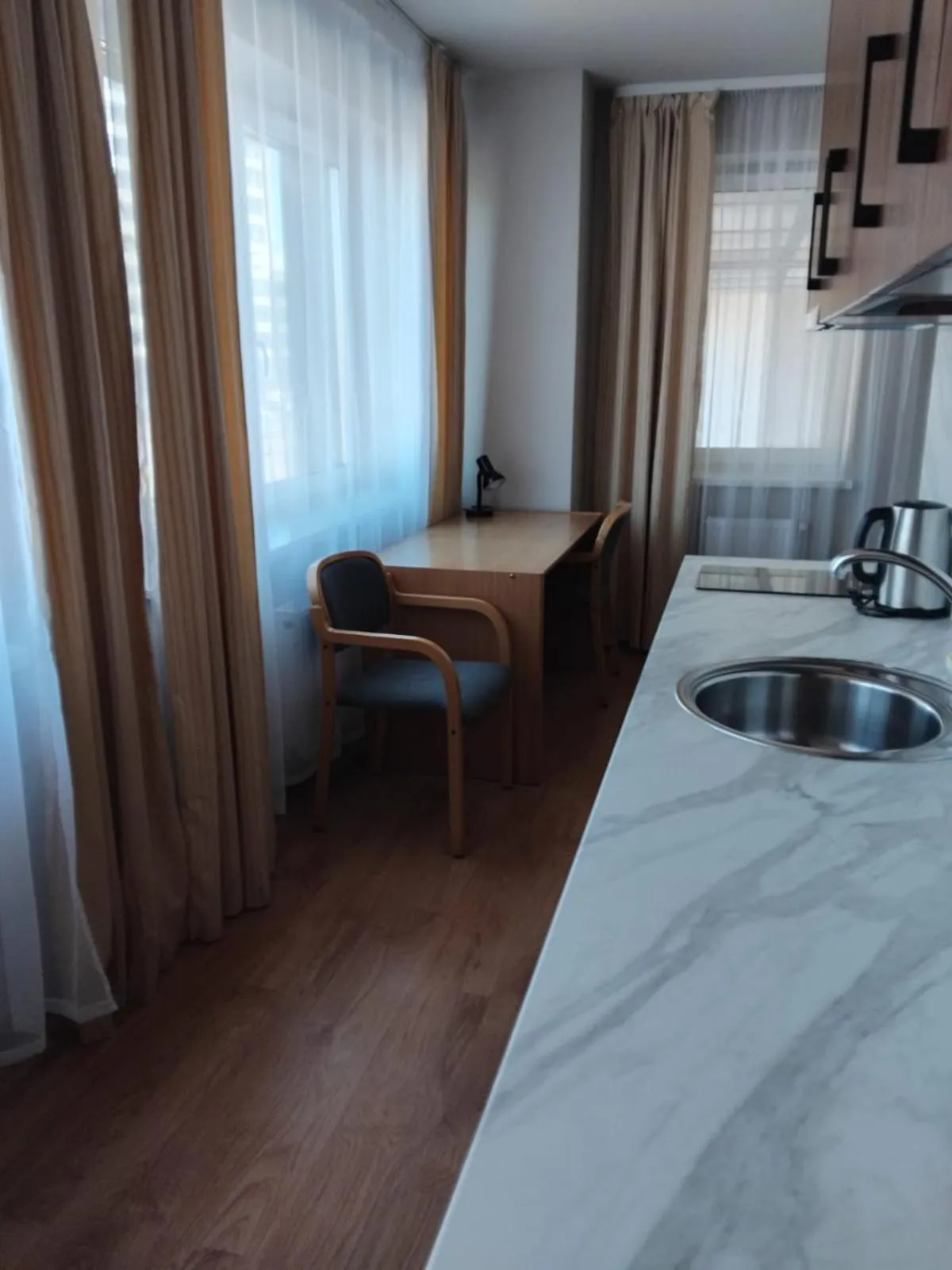 Kitchen or kitchenette, Bed in RVR Smart Apartments Riga with Free Parking and Self Check-in