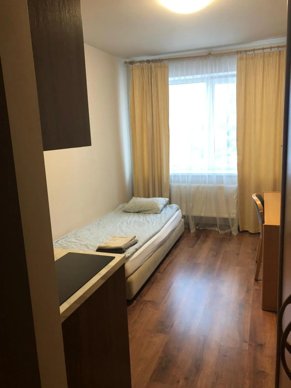 Photo of the whole room, Bed in RVR Smart Apartments Riga with Free Parking and Self Check-in