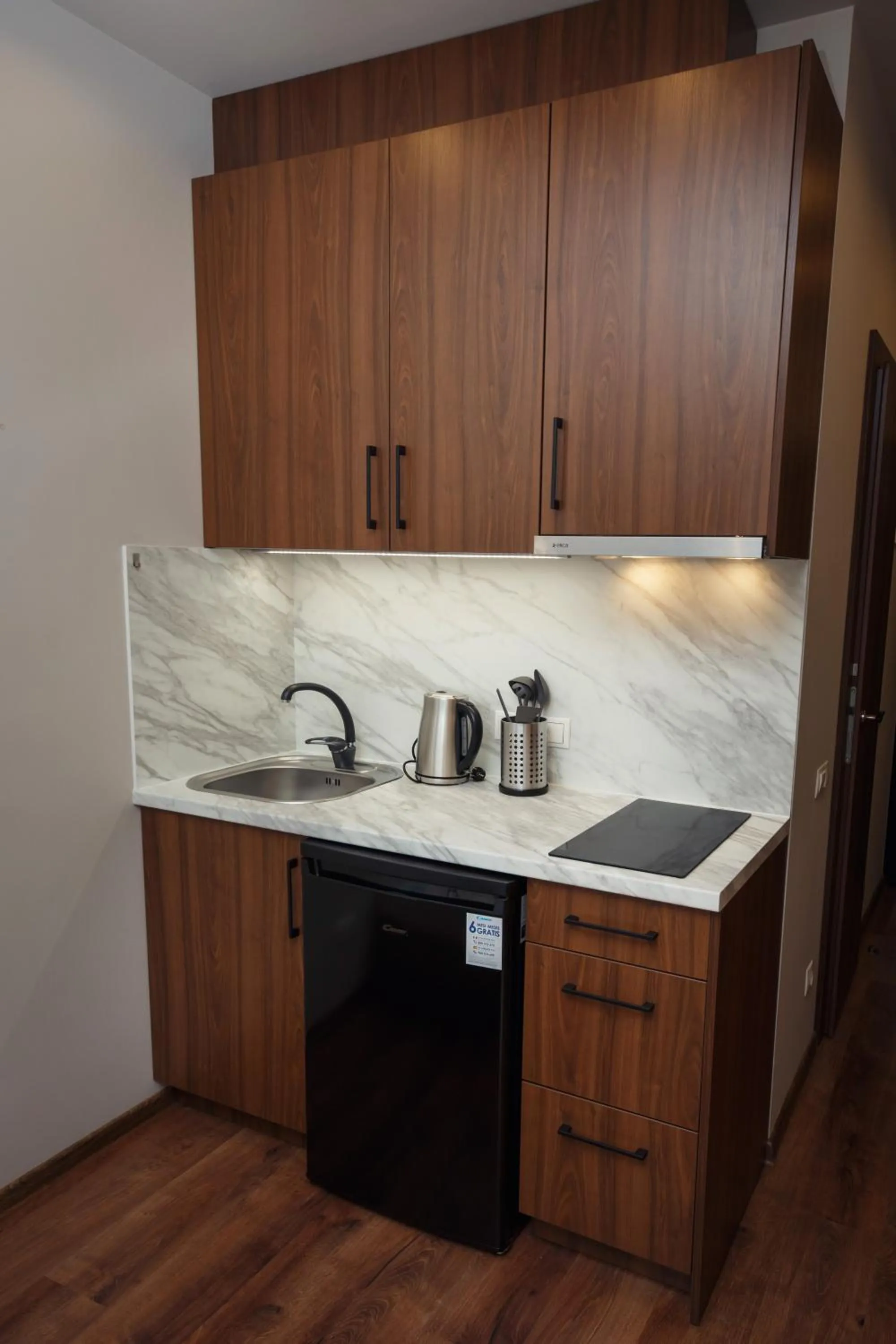 Kitchen or kitchenette in RVR Smart Apartments Riga with Free Parking and Self Check-in