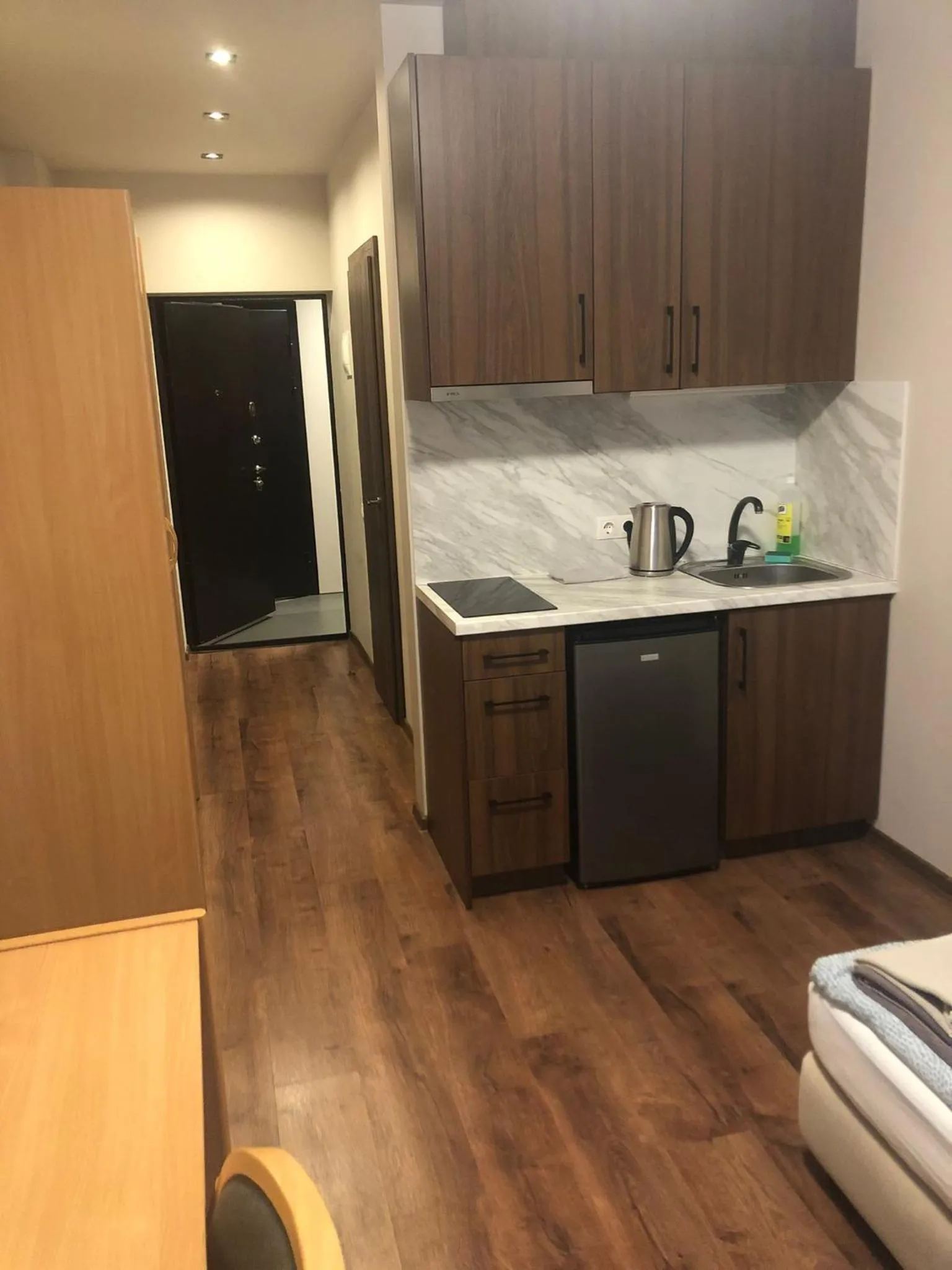 Kitchen or kitchenette in RVR Smart Apartments Riga with Free Parking and Self Check-in