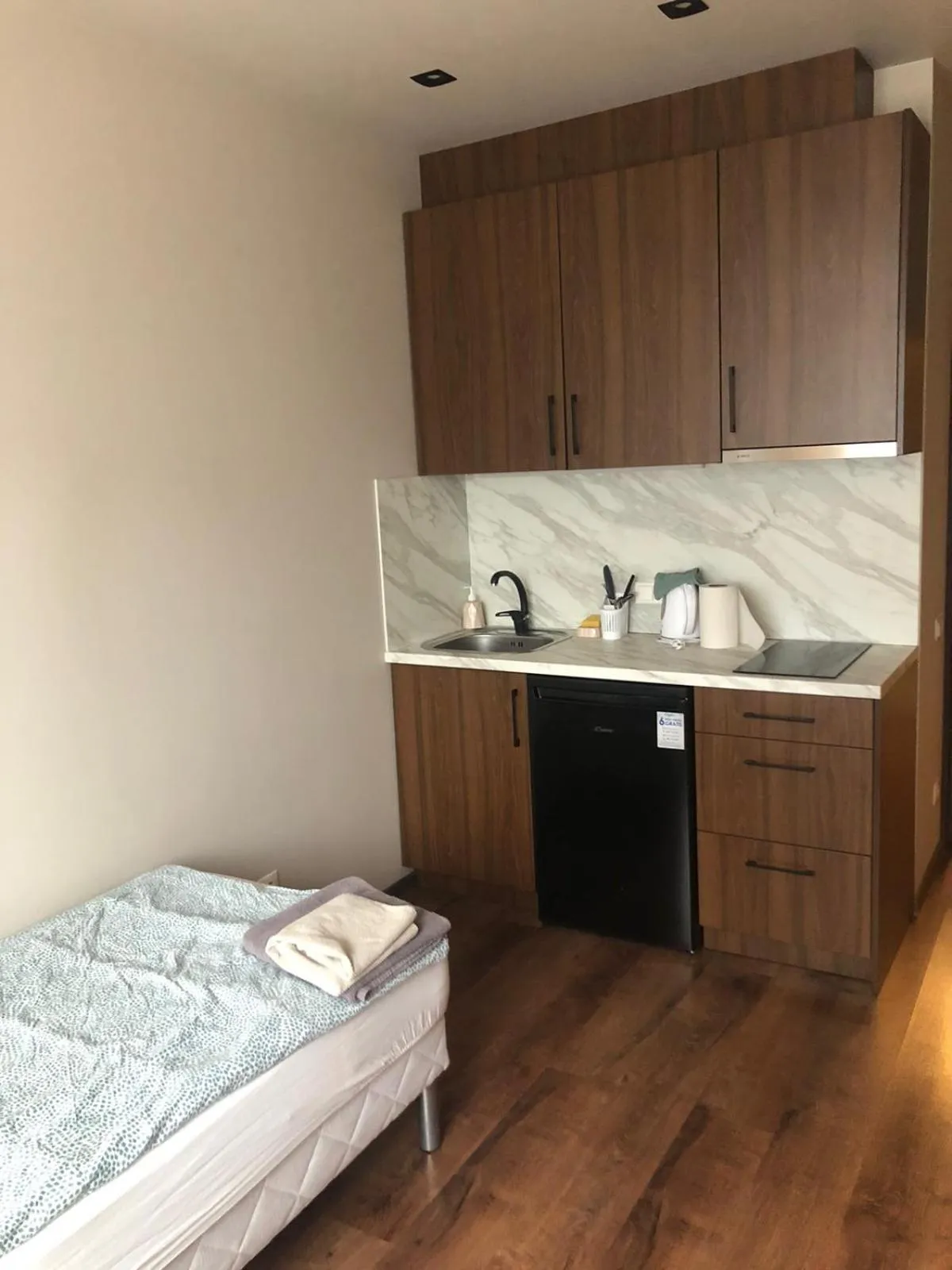 Kitchen or kitchenette, Bed in RVR Smart Apartments Riga with Free Parking and Self Check-in