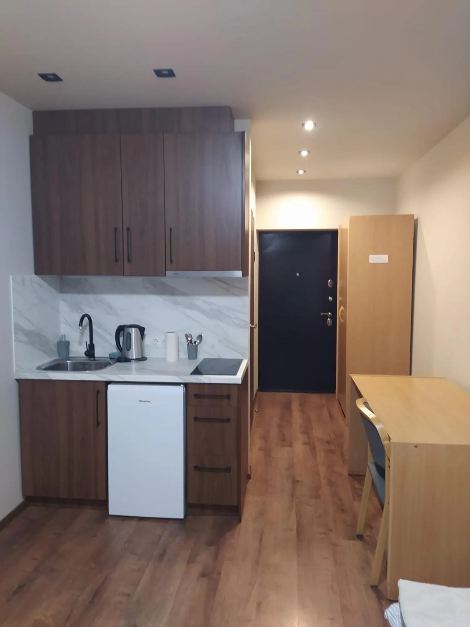 Kitchen or kitchenette in RVR Smart Apartments Riga with Free Parking and Self Check-in