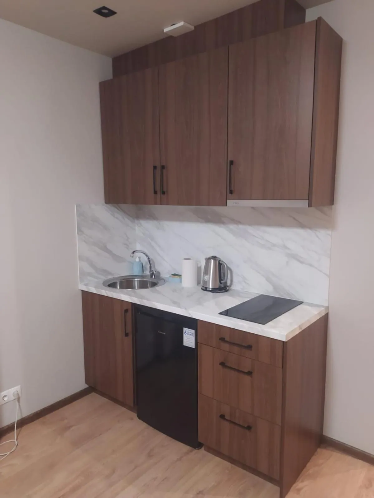 Kitchen or kitchenette in RVR Smart Apartments Riga with Free Parking and Self Check-in