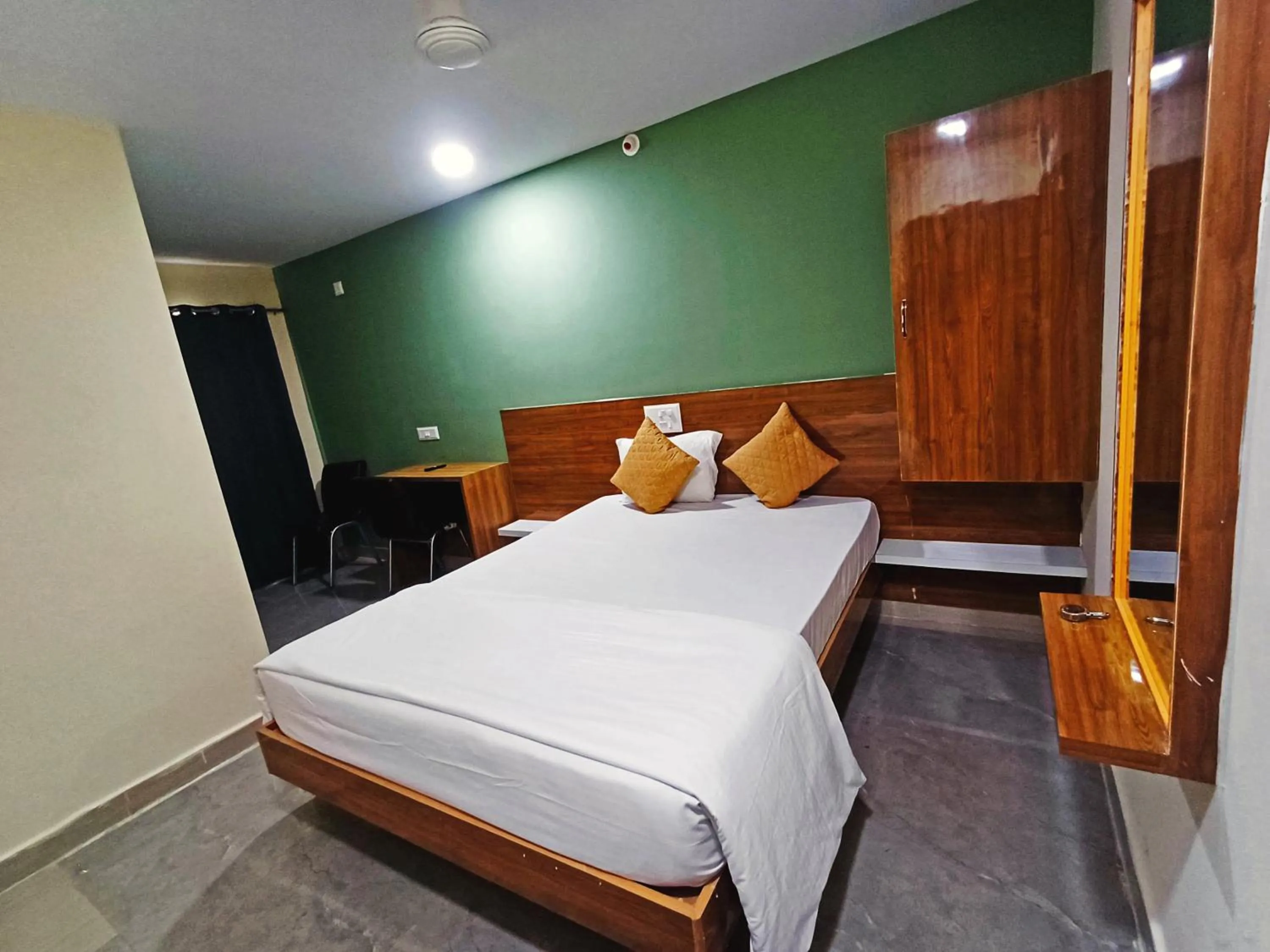 Bedroom, Bed in Udupi Deluxe Lodge Gulbarga