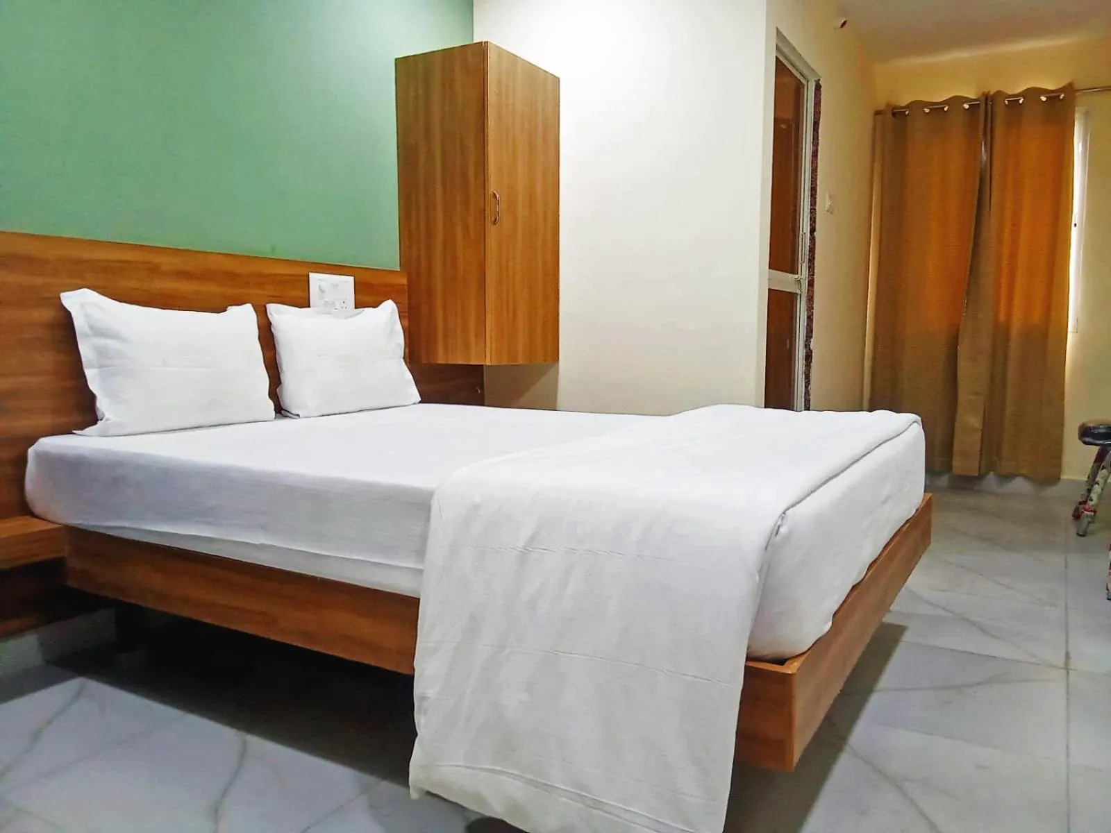 Bedroom, Bed in Udupi Deluxe Lodge Gulbarga
