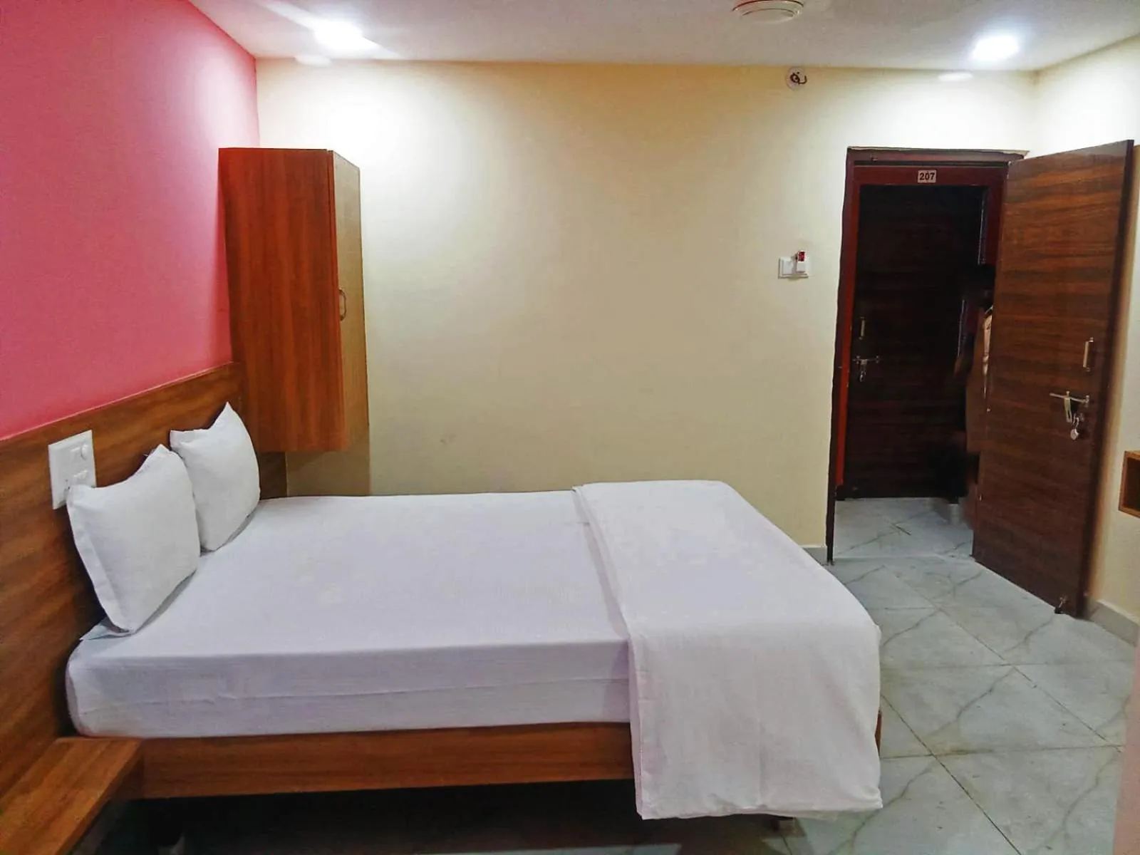 Bedroom, Bed in Udupi Deluxe Lodge Gulbarga