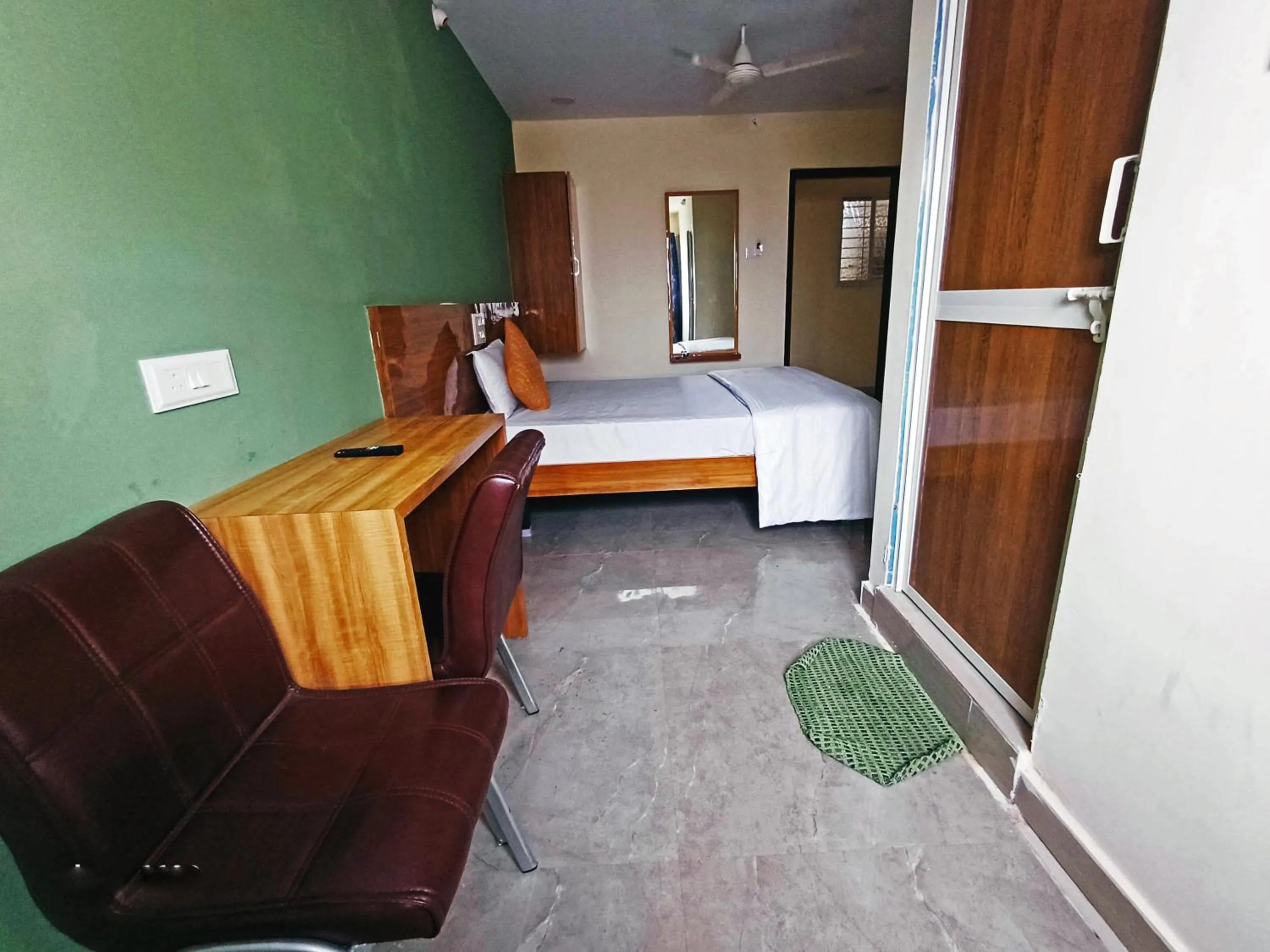 Bedroom, Bed in Udupi Deluxe Lodge Gulbarga