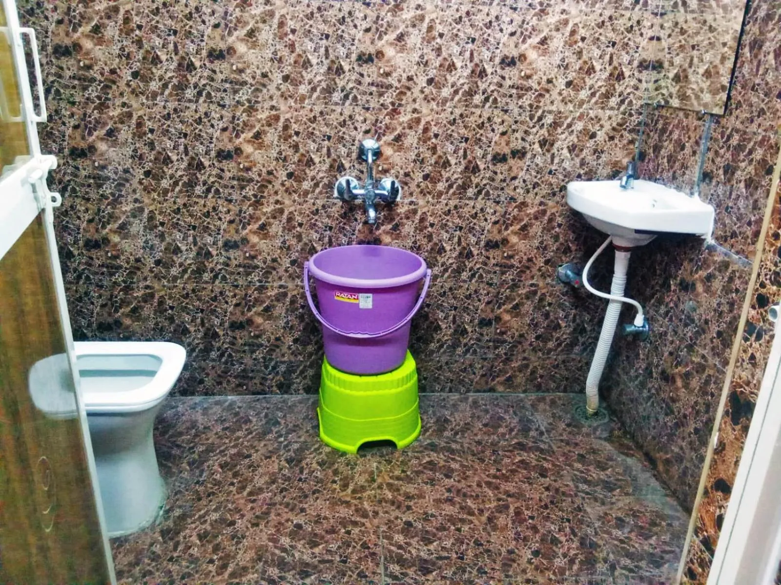 Bathroom in Udupi Deluxe Lodge Gulbarga