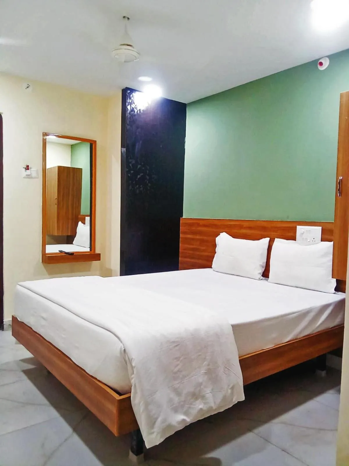 Bedroom, Bed in Udupi Deluxe Lodge Gulbarga