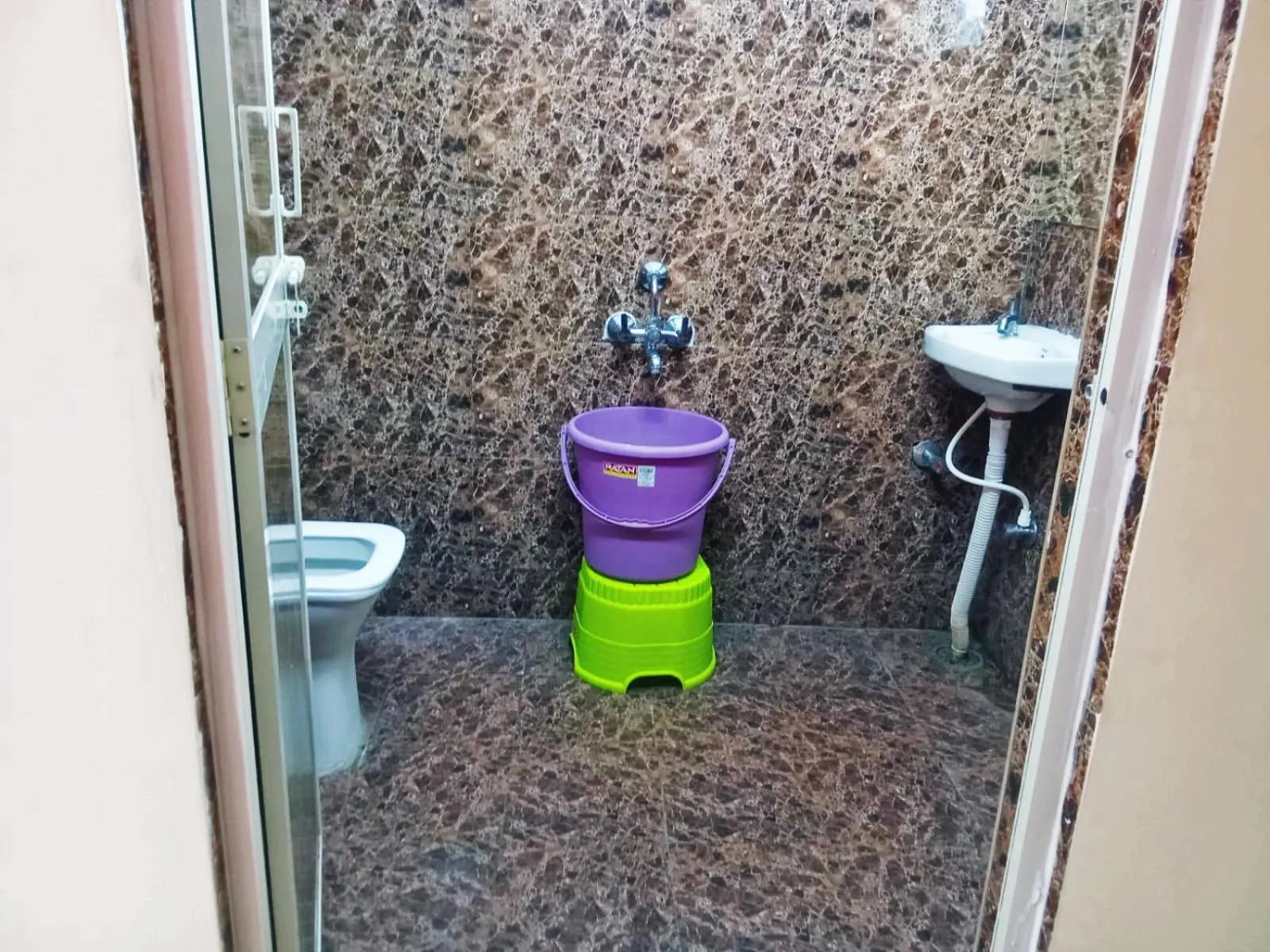 Bathroom in Udupi Deluxe Lodge Gulbarga