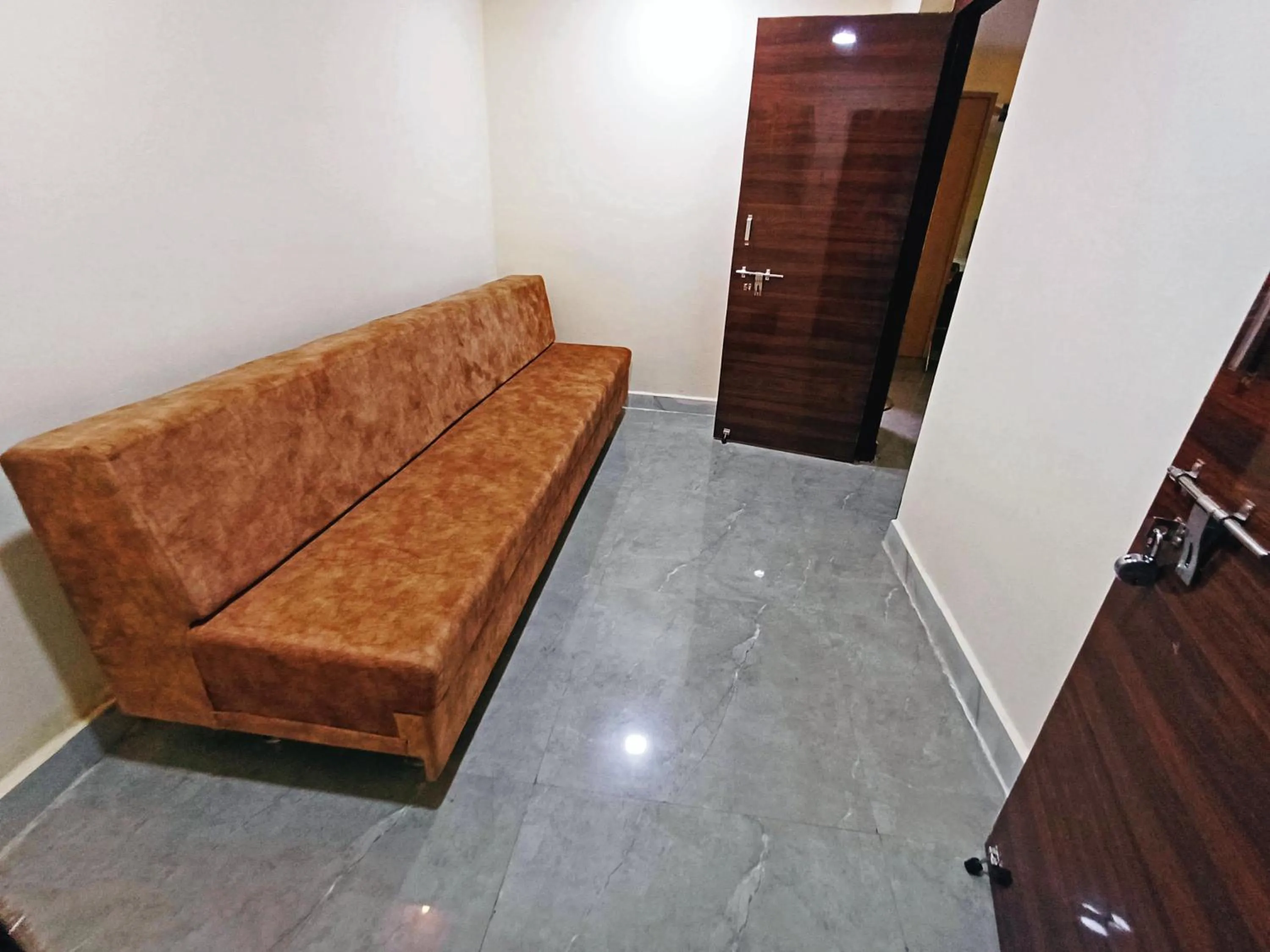 Seating area in Udupi Deluxe Lodge Gulbarga