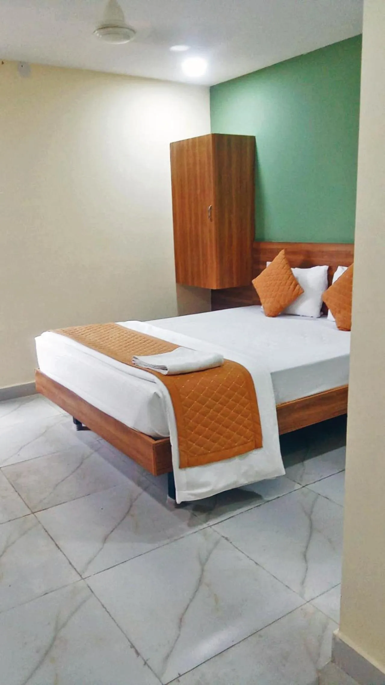 Bedroom, Bed in Udupi Deluxe Lodge Gulbarga