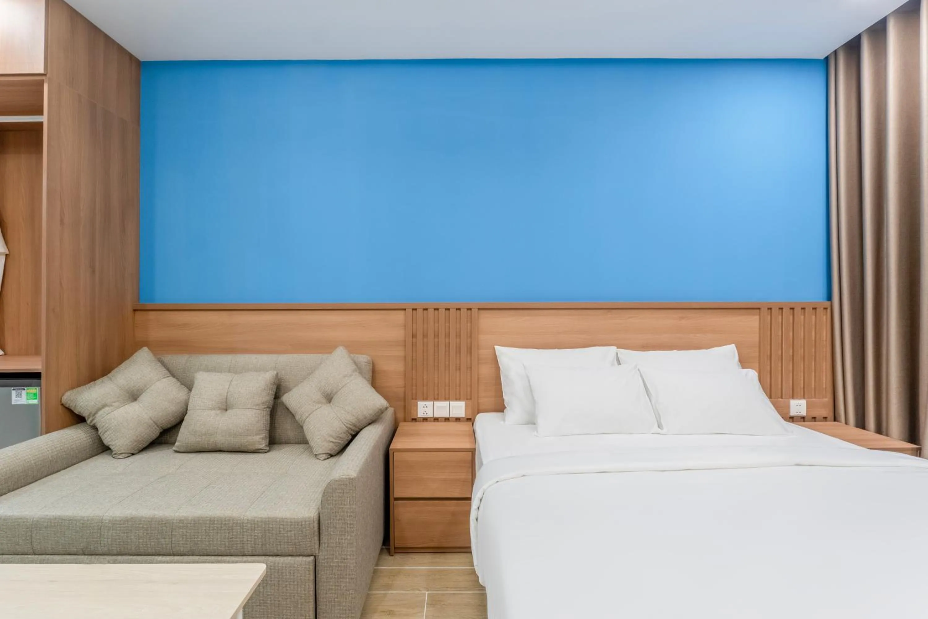 Bed in HL Melody Boutique Hotel