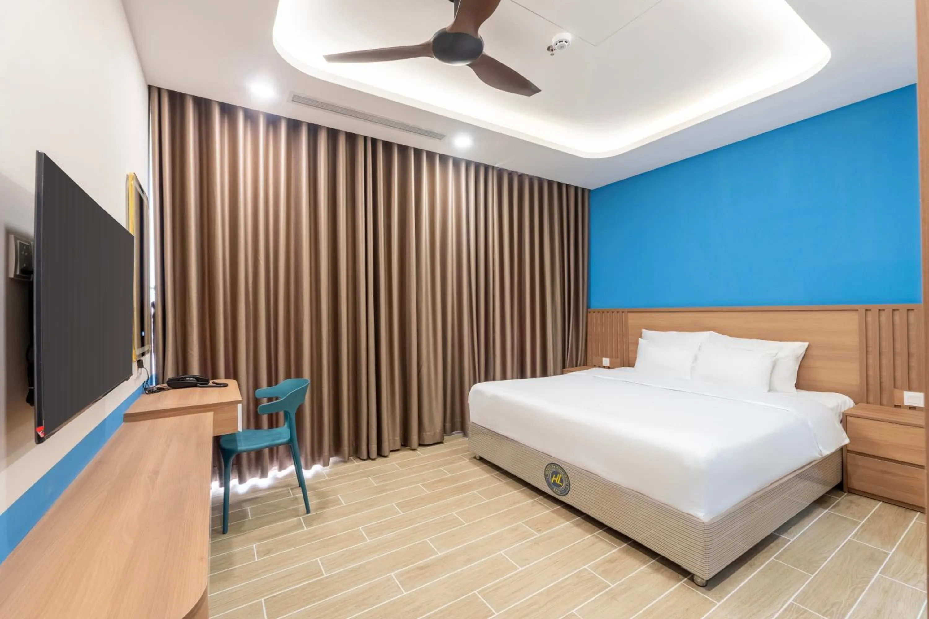 Dining area, Bed in HL Melody Boutique Hotel