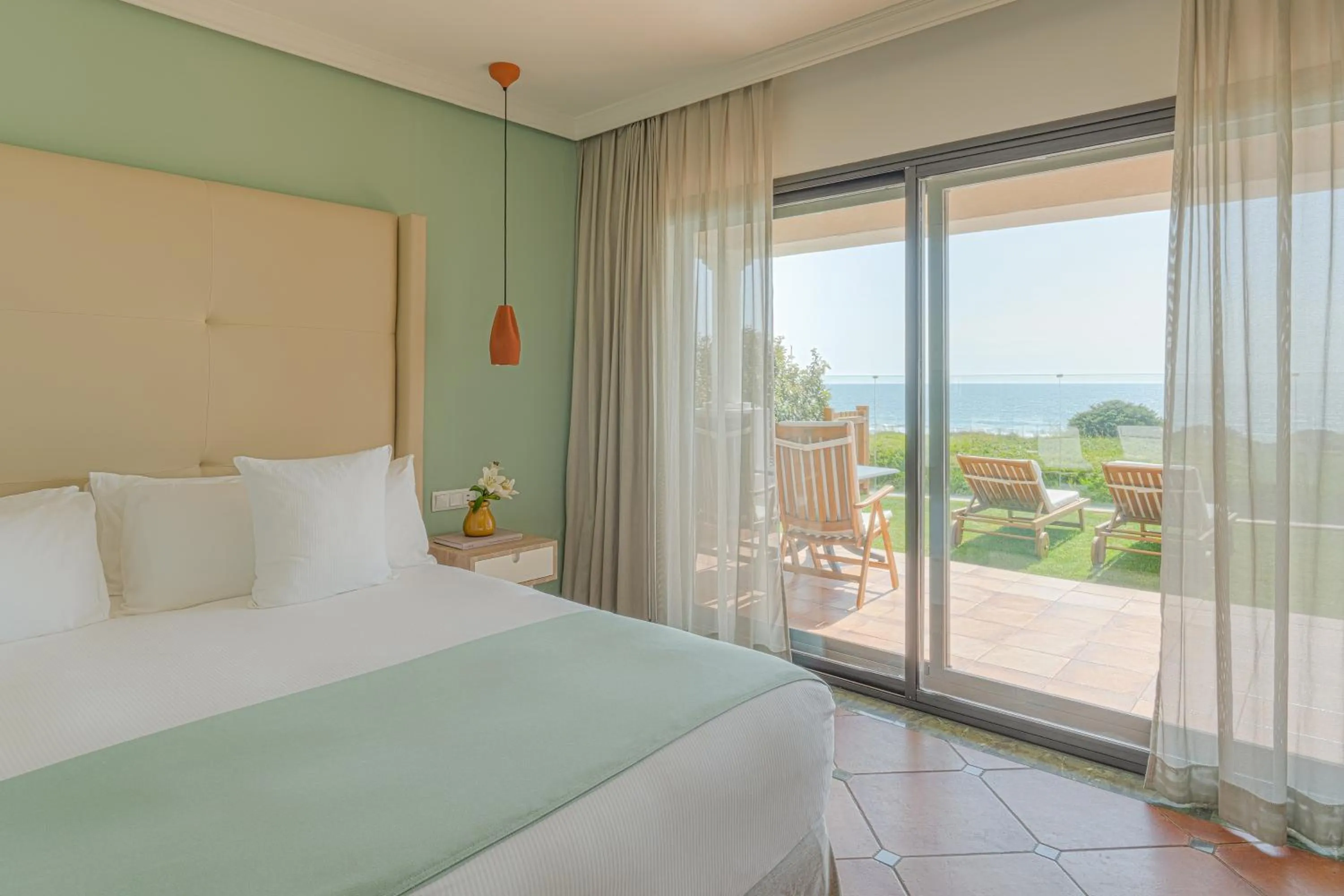 Photo of the whole room, Bed in Palacio de Sancti Petri, a Gran Meliá - The Leading Hotels of the World