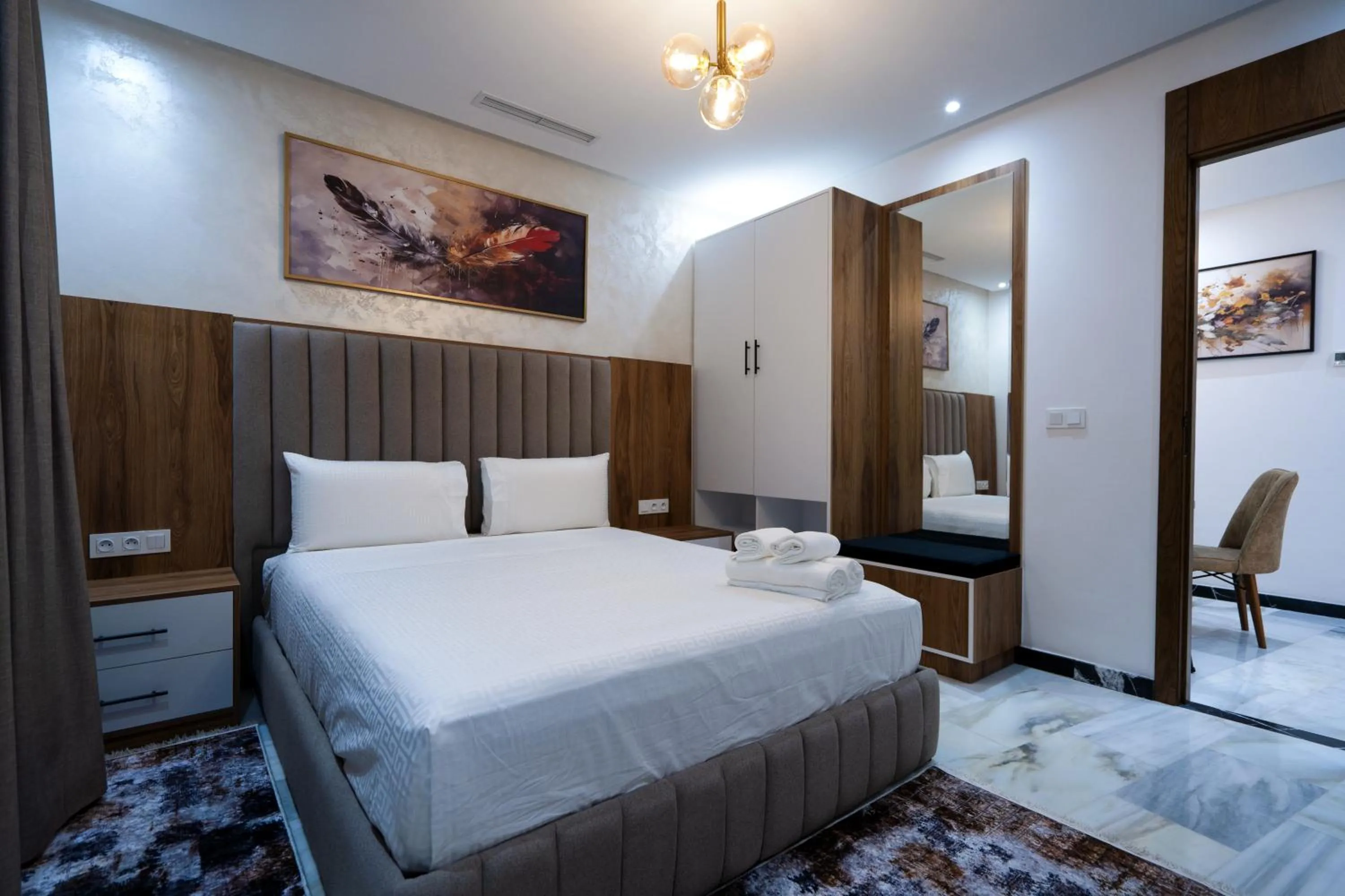 Bed in IMMOKA SUITEs
