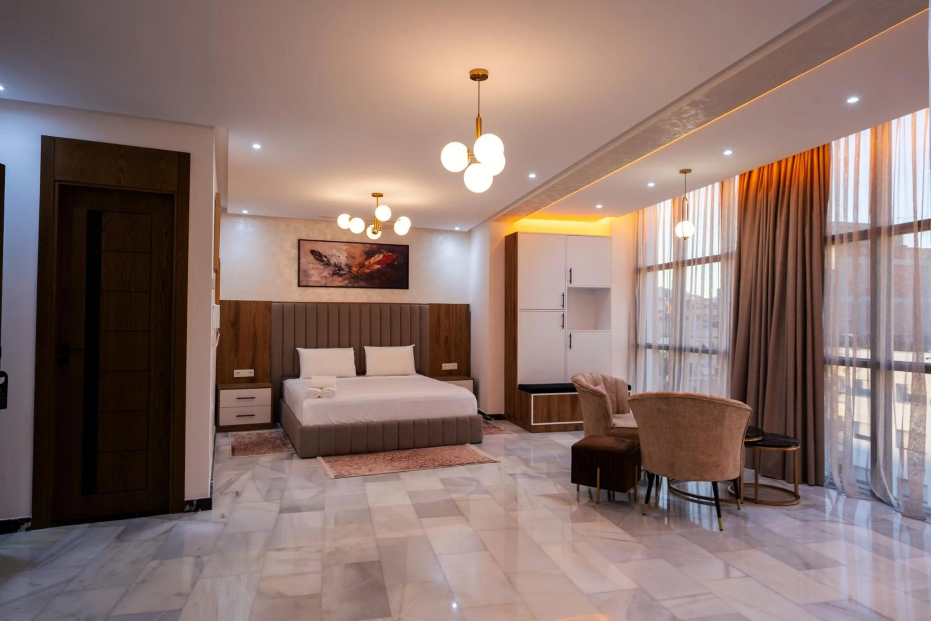 Bed in IMMOKA SUITEs