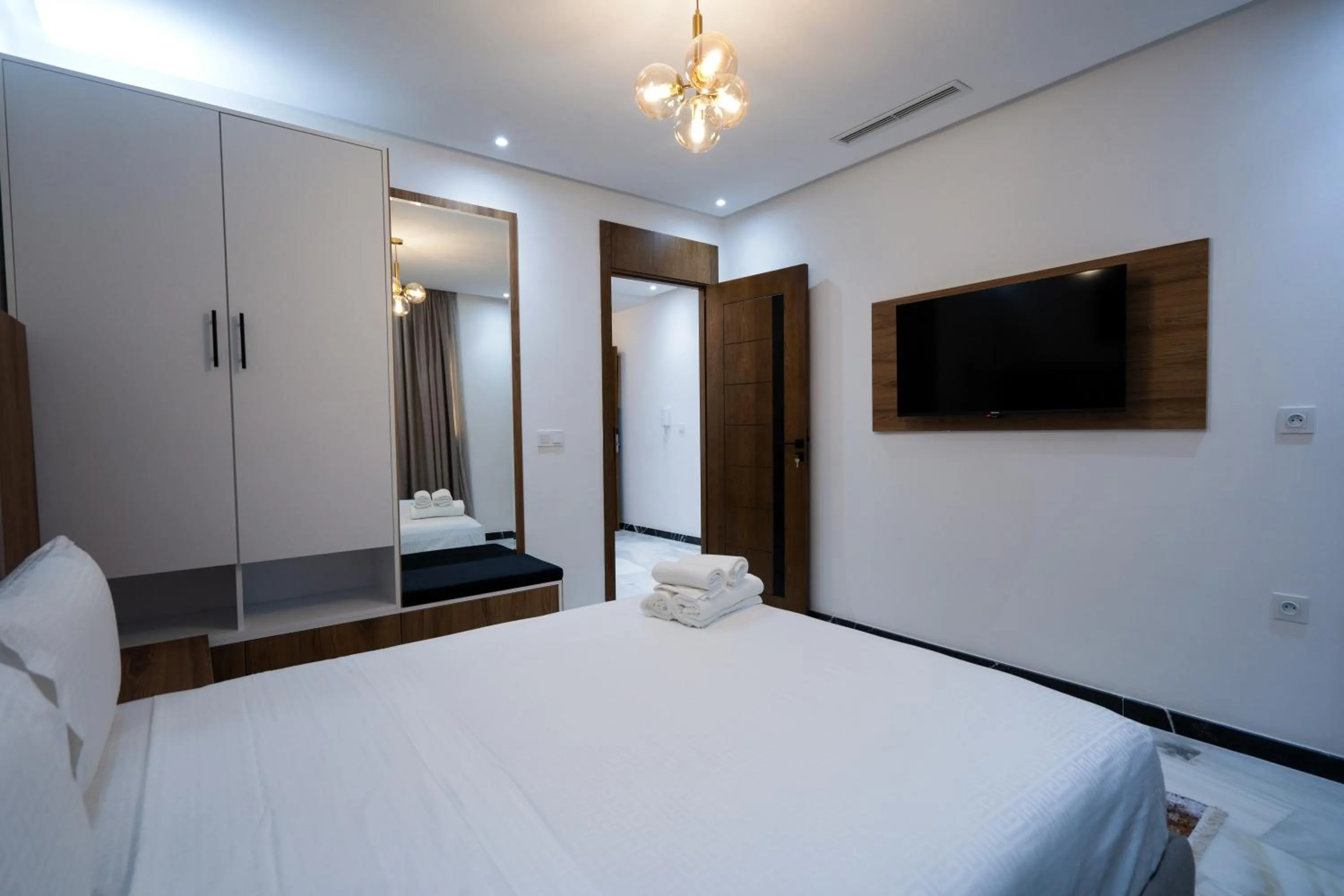 Bed in IMMOKA SUITEs