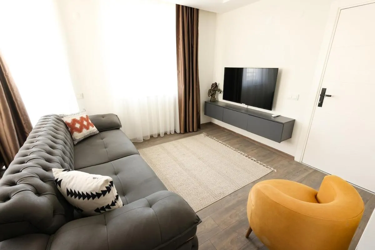 Communal lounge/ TV room in Sorta Hotel