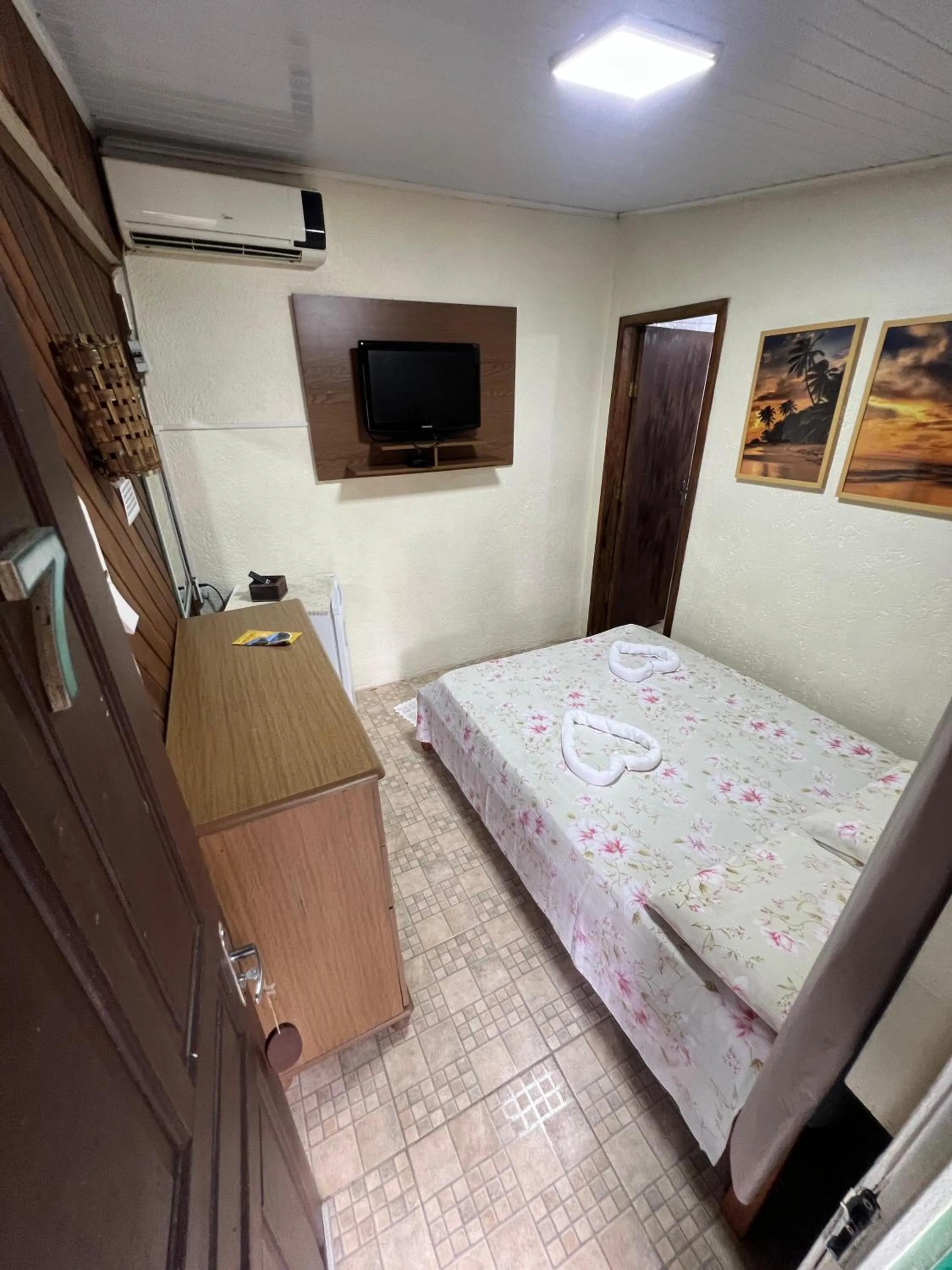 Bed in Pousada Coração da Ilha