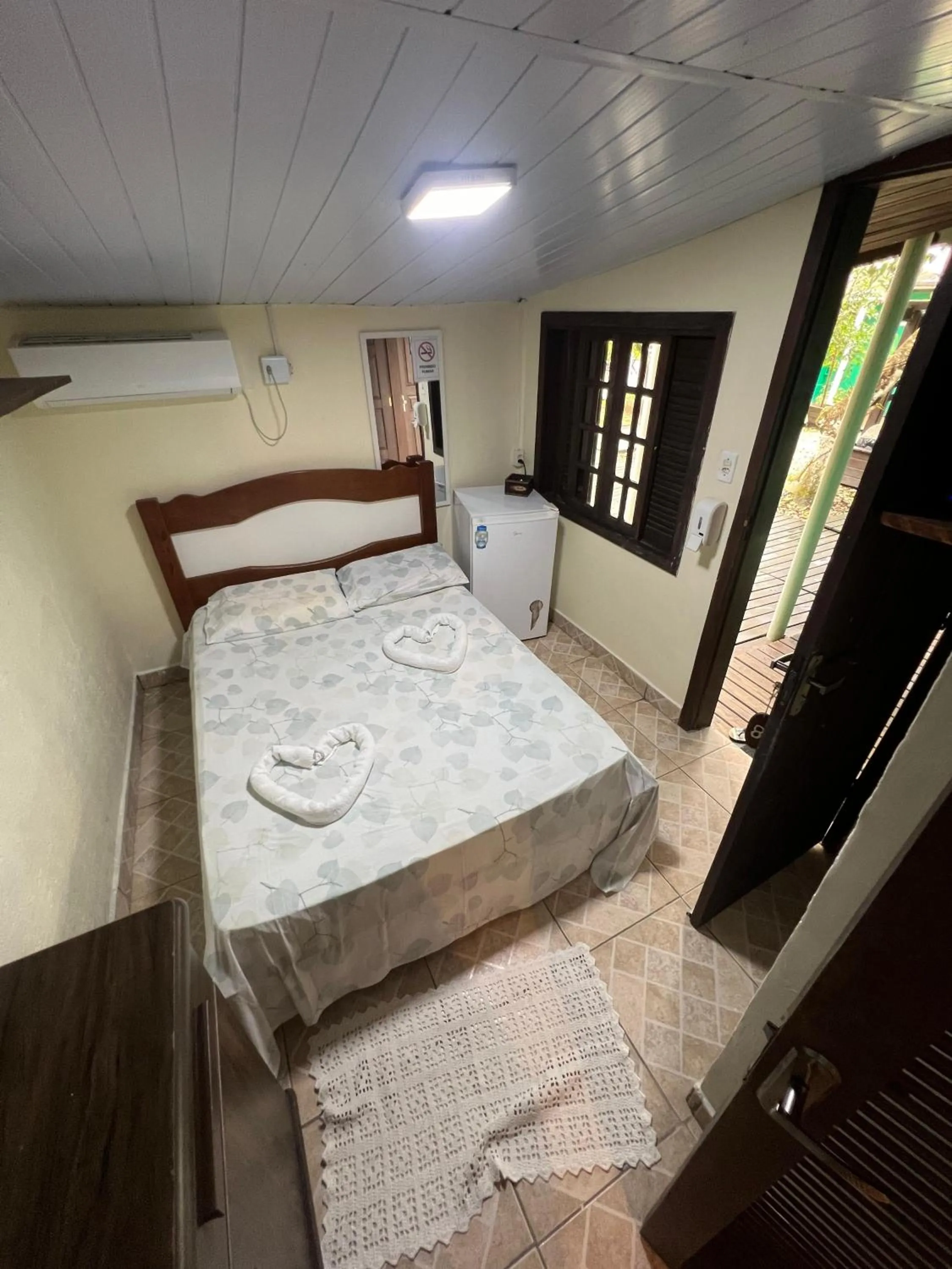 Bed in Pousada Coração da Ilha