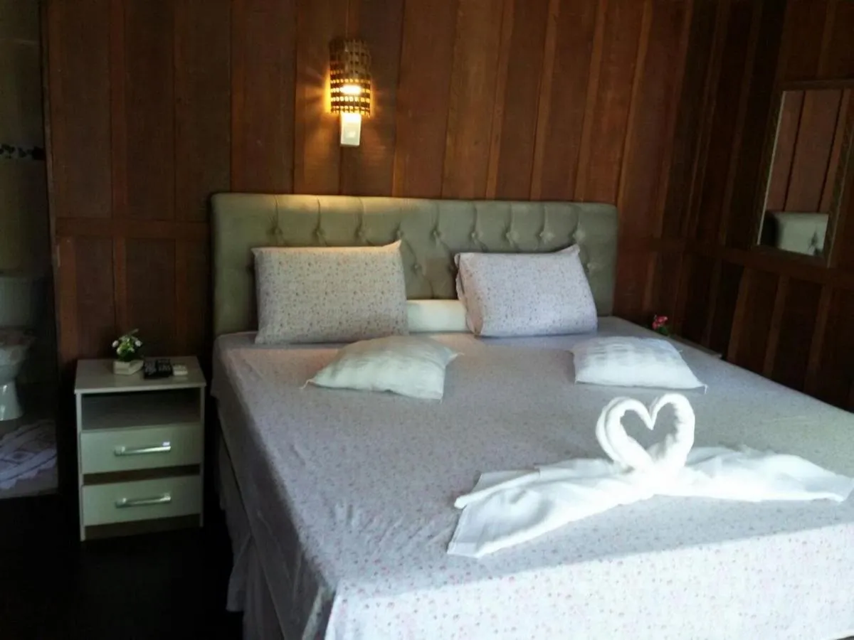 Bed in Pousada Coração da Ilha