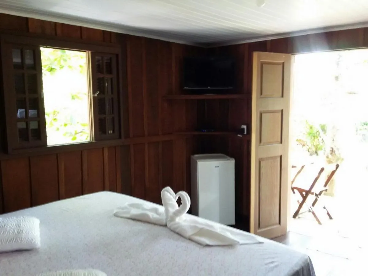 Bed in Pousada Coração da Ilha