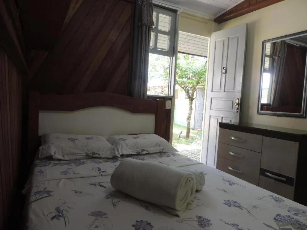 Bed in Pousada Coração da Ilha