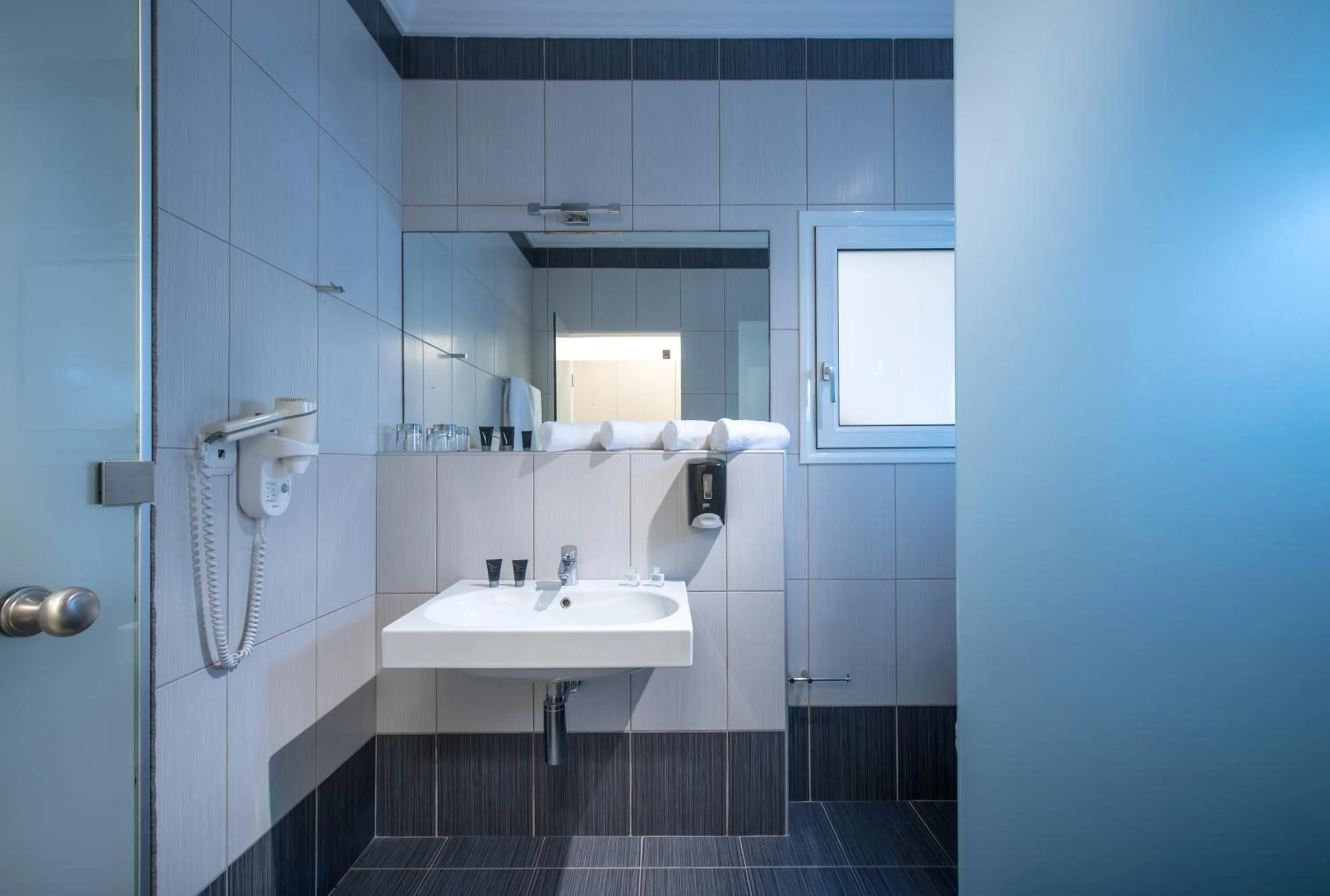 Bathroom in Hotel Matheo Villas & Suites