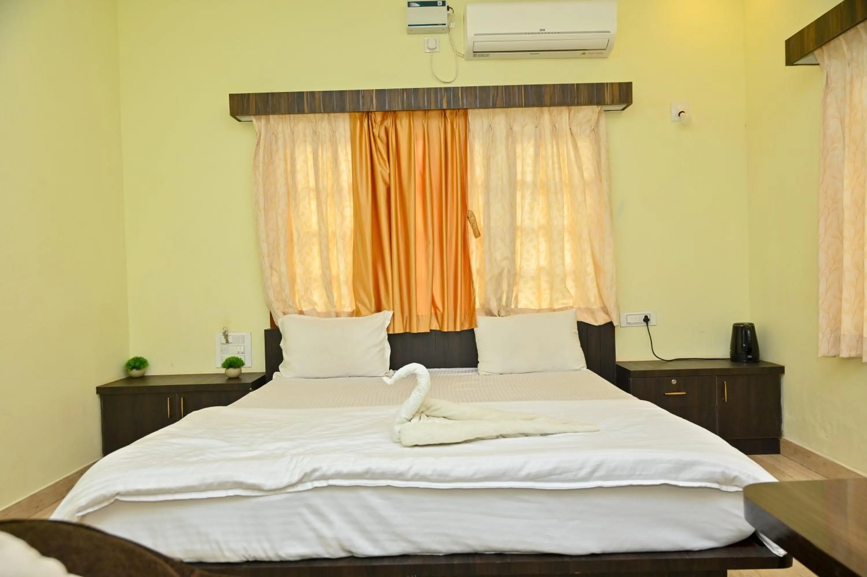 Bed in NAVARATHNA International resort