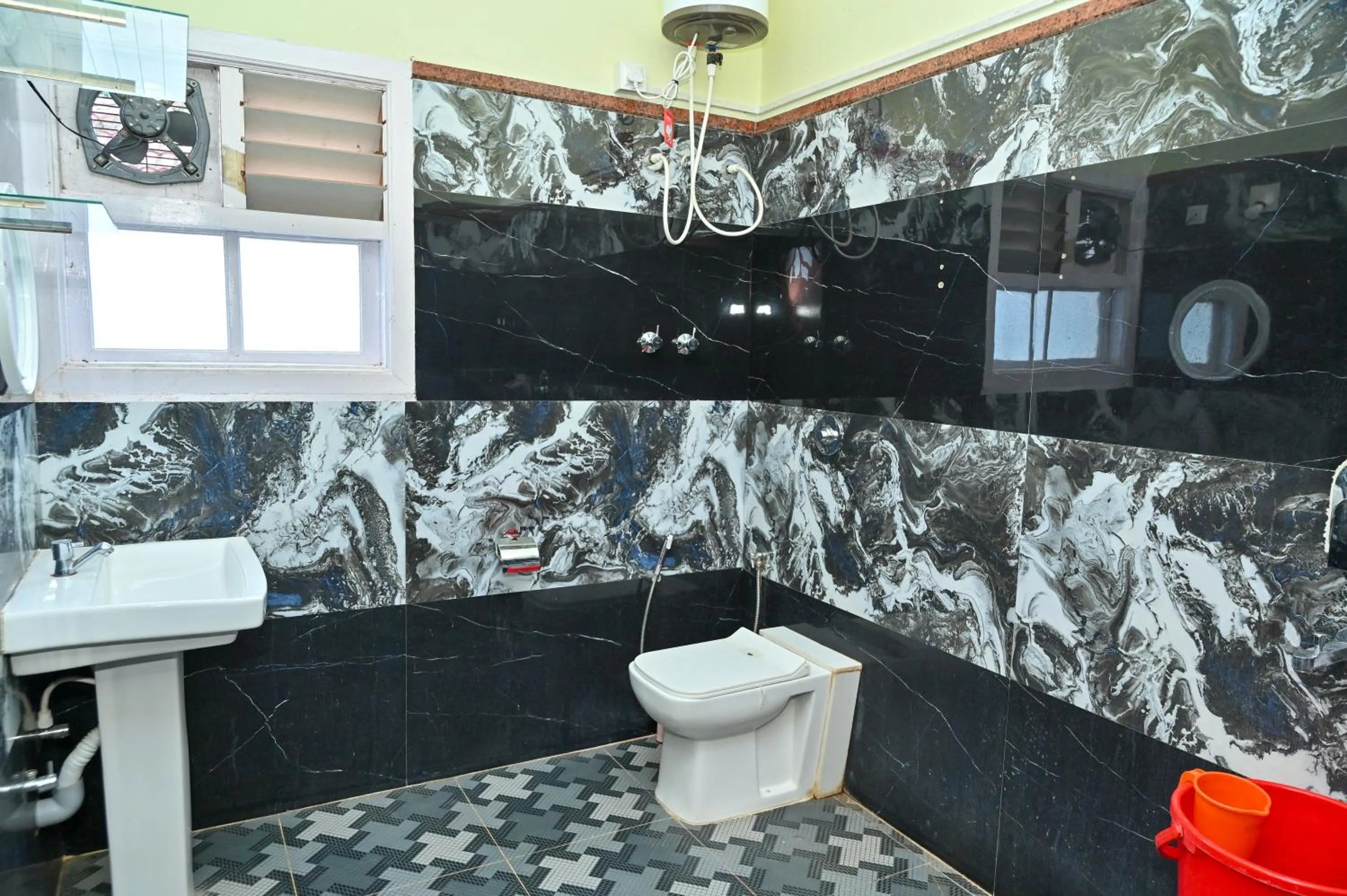 Toilet in NAVARATHNA International resort