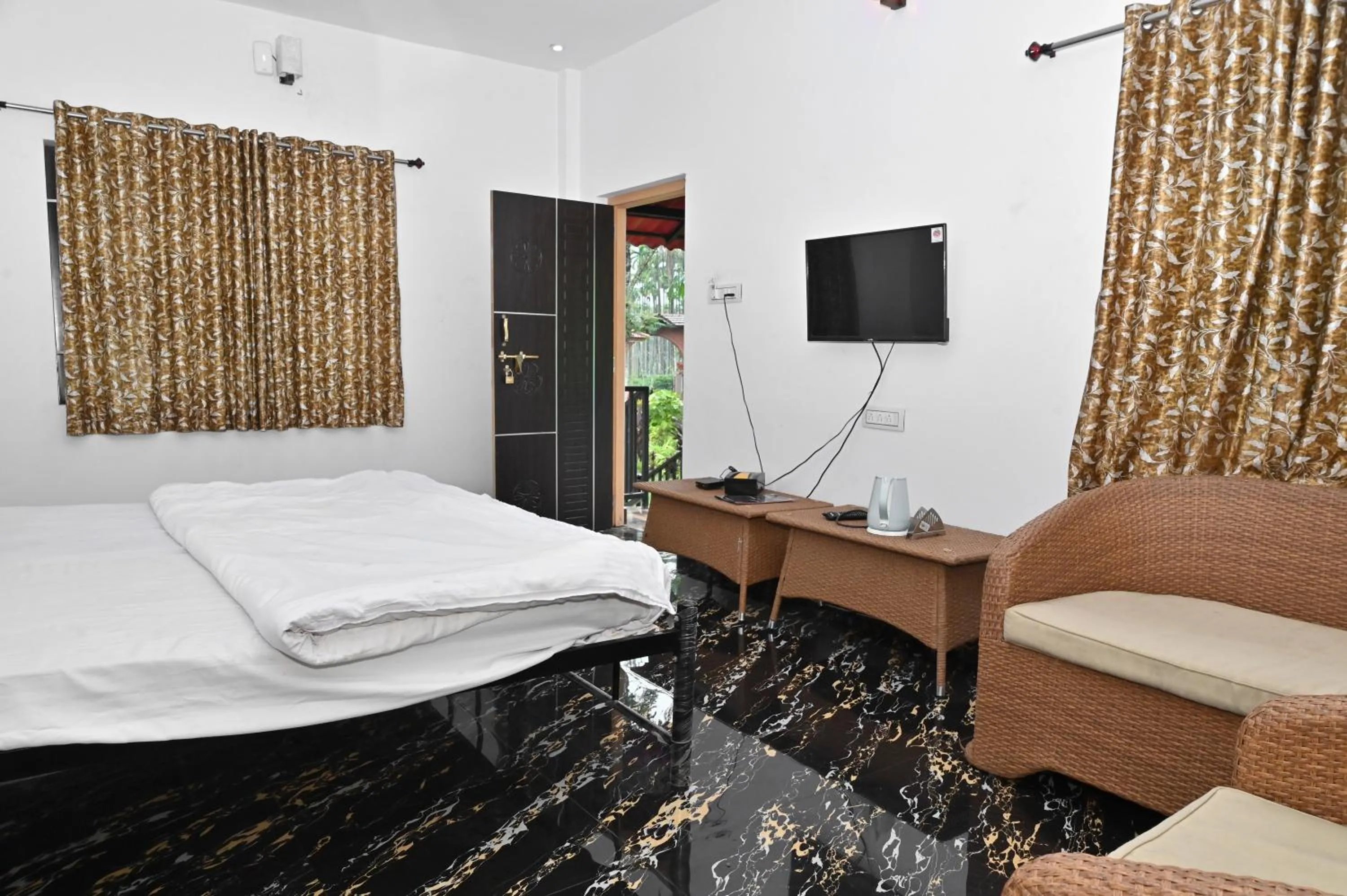 Bed in NAVARATHNA International resort