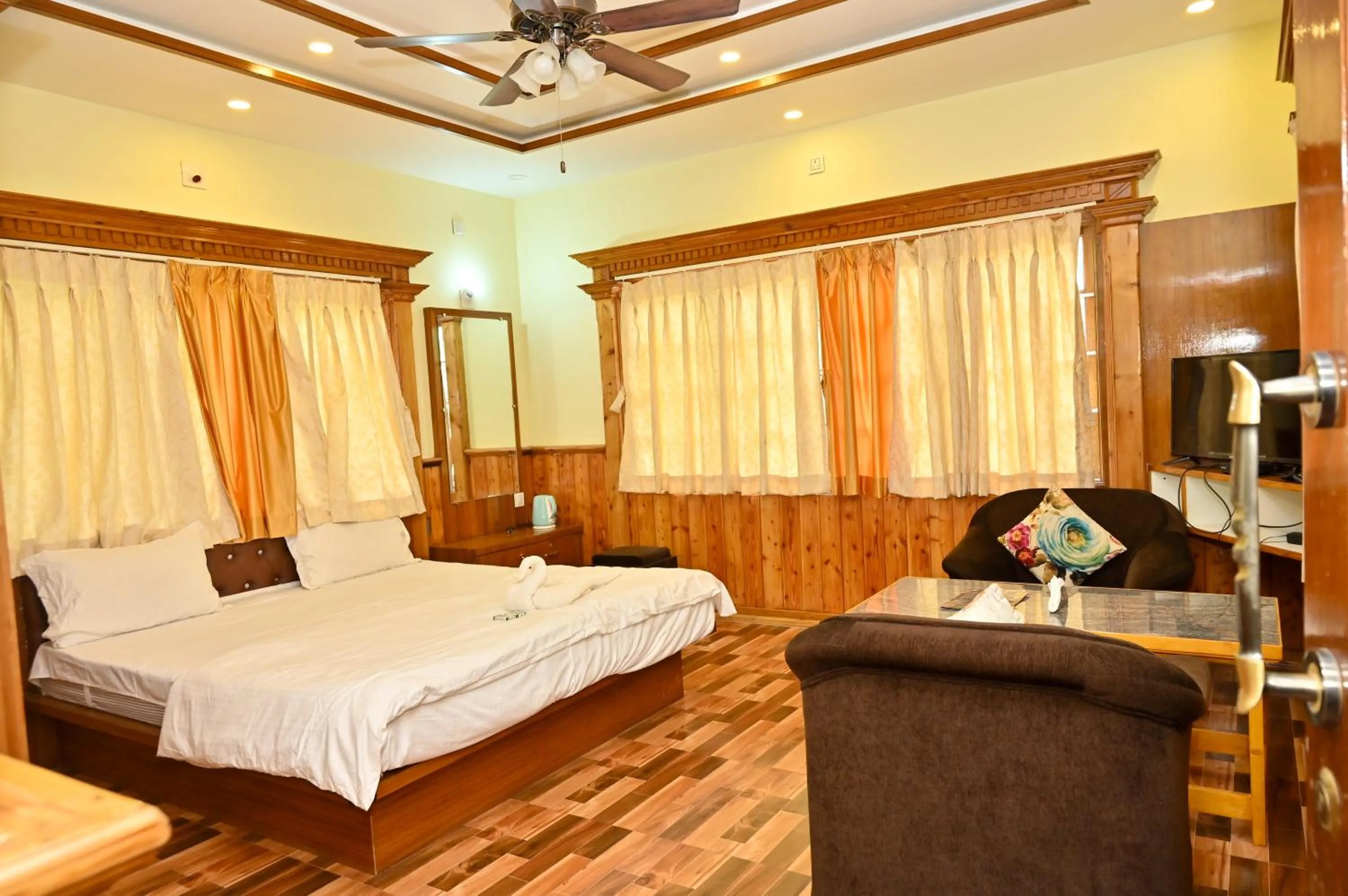 Bed in NAVARATHNA International resort