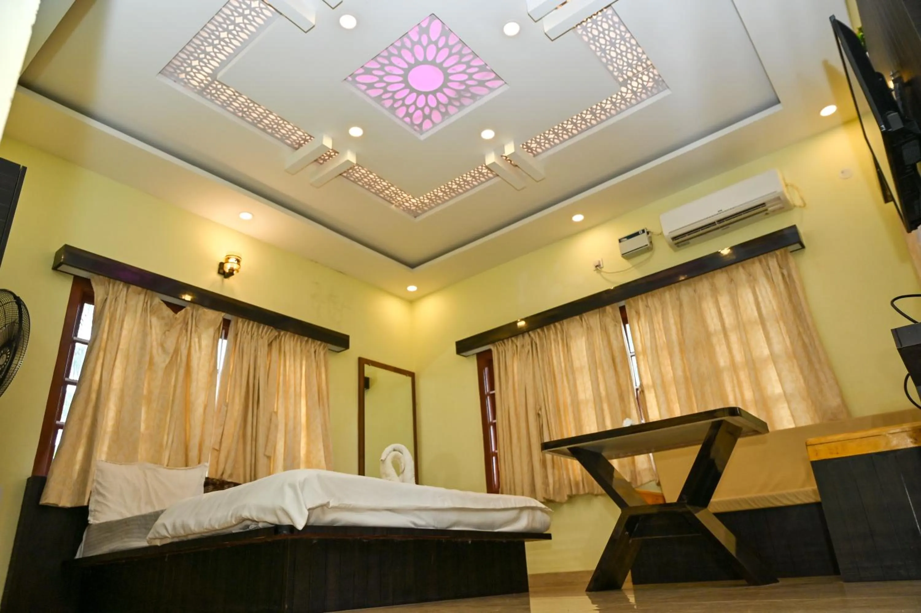 Bed in NAVARATHNA International resort