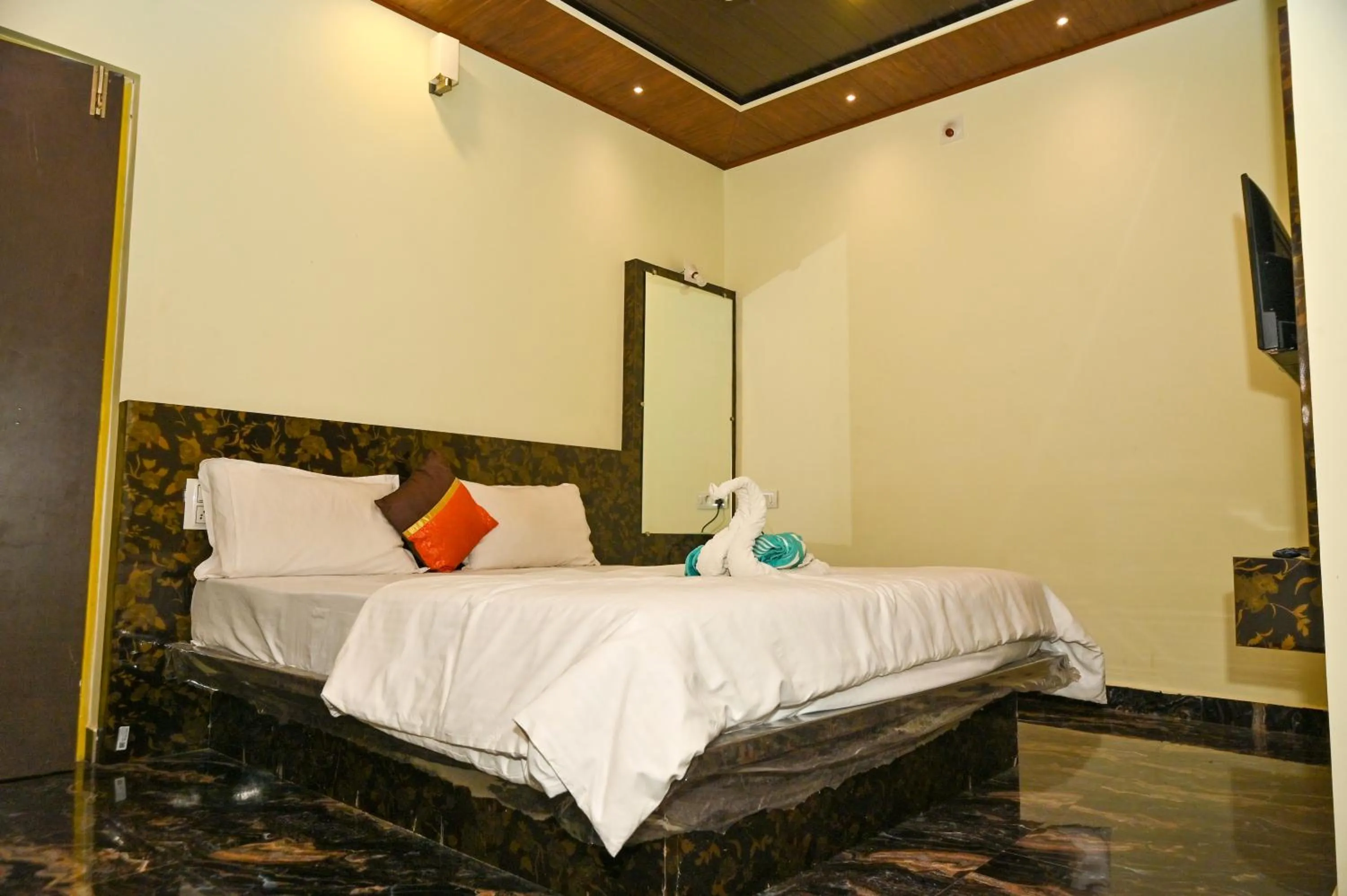 Bed in NAVARATHNA International resort