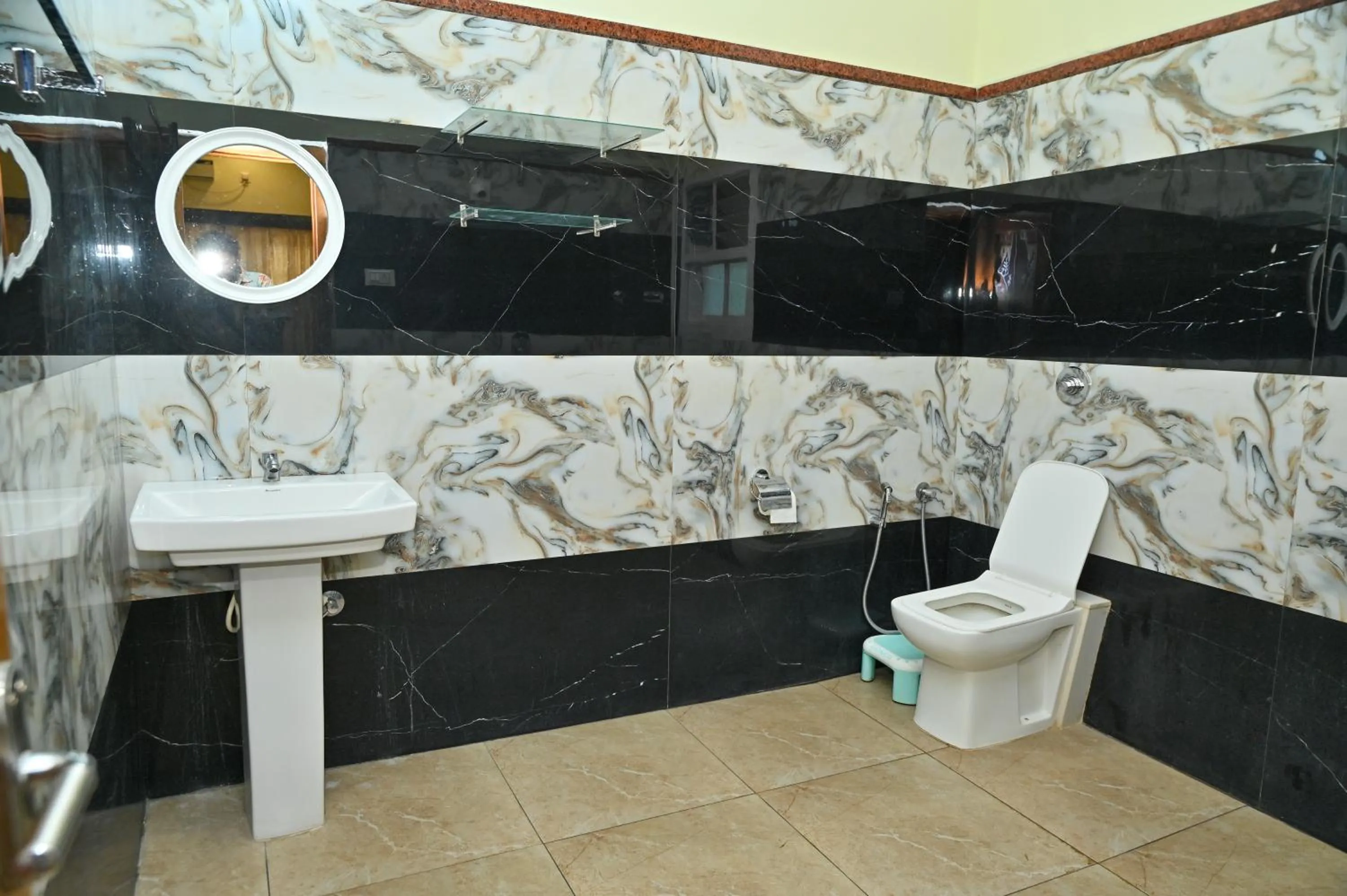Bathroom in NAVARATHNA International resort