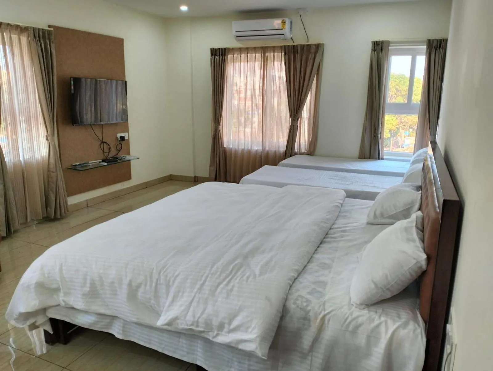 Bed in Amma Inn Elegance Suites and Apartments