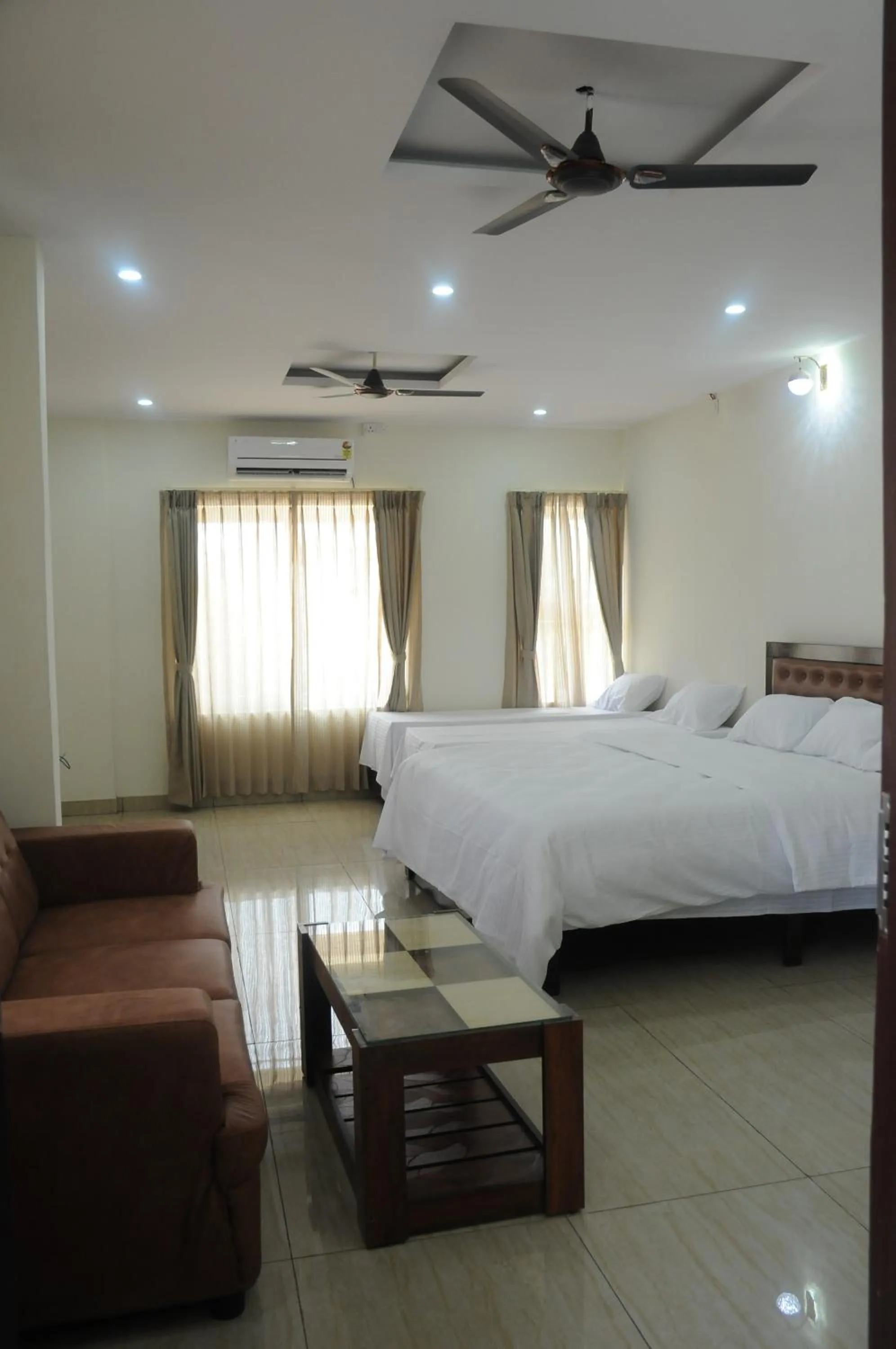 Bed in Amma Inn Elegance Suites and Apartments